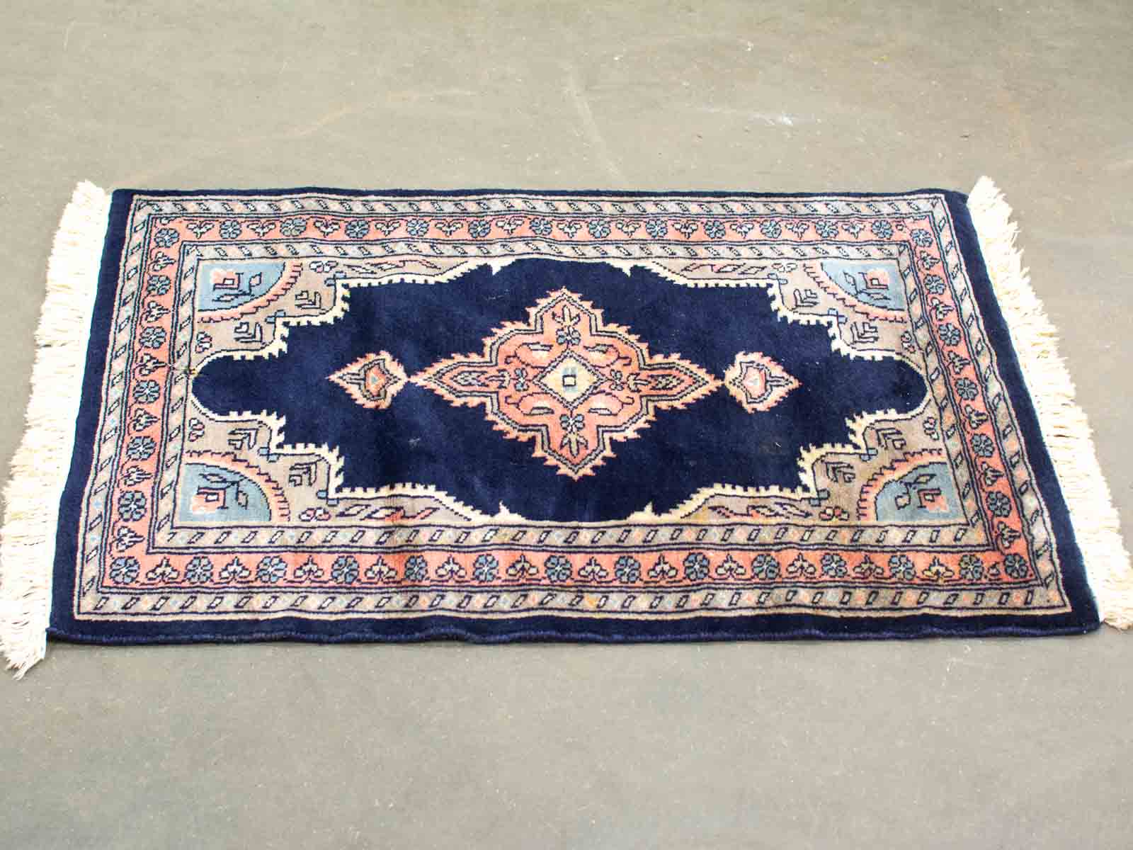 Handwoven Traditional Navy Rug with Warm, Intricate Patterns