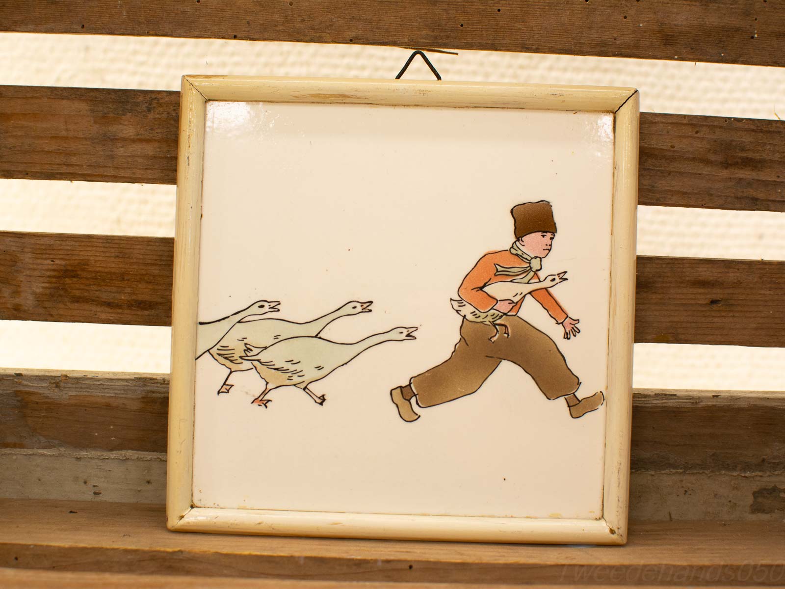 Playful boy in vibrant attire running with geese, illustrating childhood adventure and whimsy.