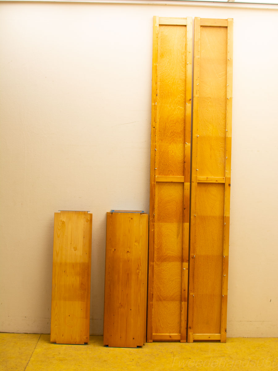 Contrasting heights of quality wooden elements ready for assembly, showcasing natural finish and craftsmanship.