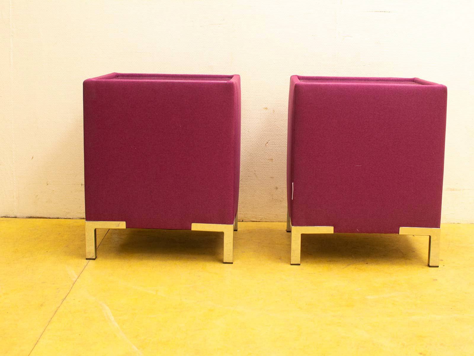 Contemporary deep purple minimalist stools with sleek metallic legs for modern home and commercial interiors.