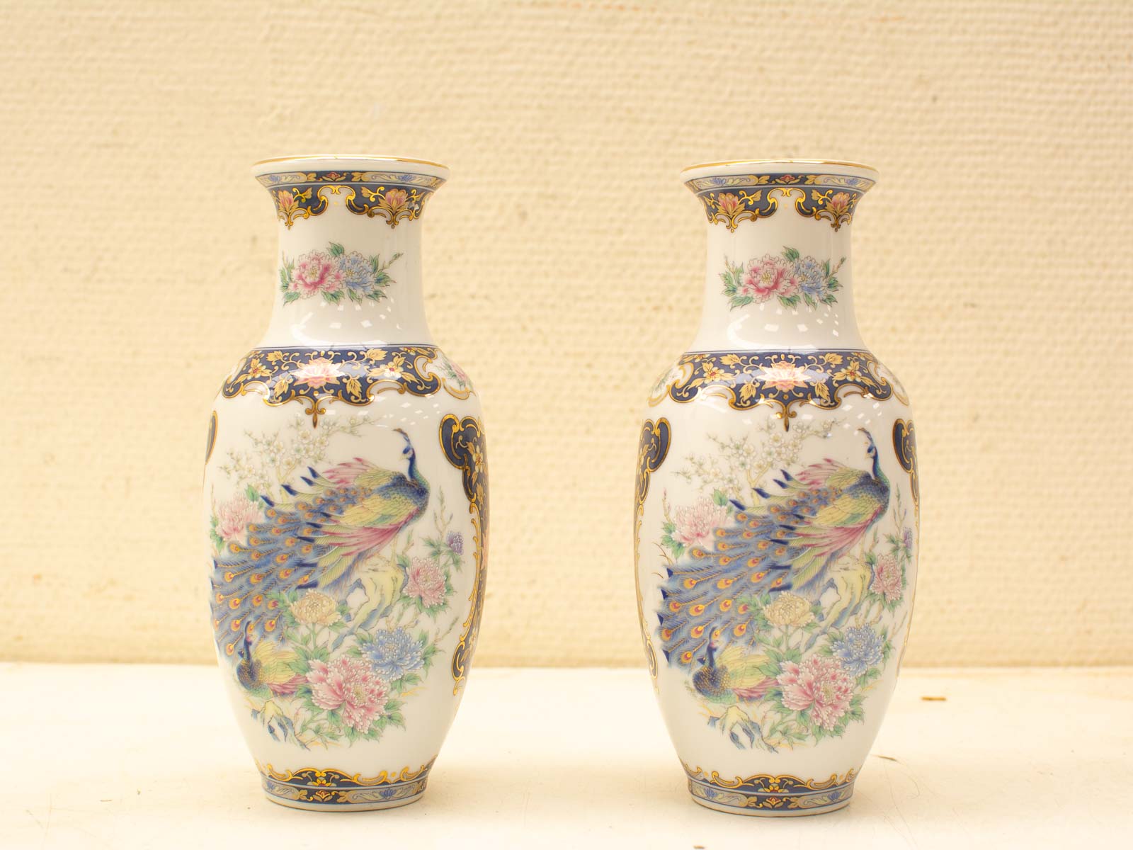 Exquisite Porcelain Vases with Vibrant Peacock and Floral Design, Enhanced with Gold Accents