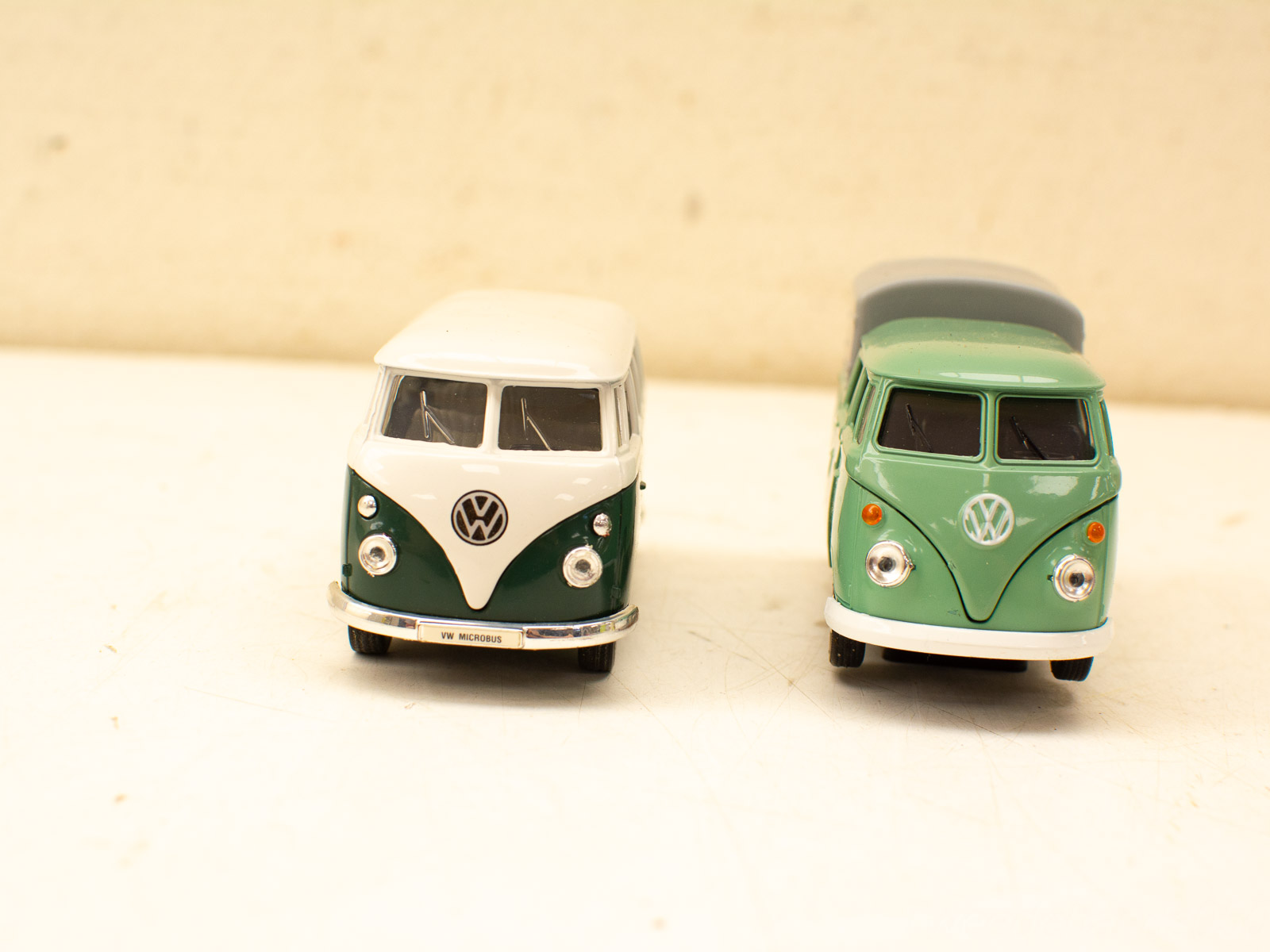 Classic Volkswagen Microbus models in vibrant colors, embodying retro charm and automotive nostalgia.