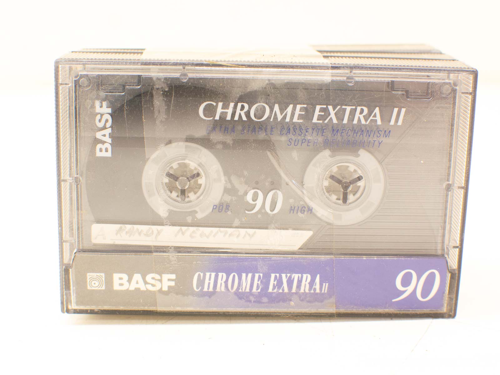 Vintage BASF Chrome Extra II cassette tape, evoking nostalgia for analog music sharing and personalization.