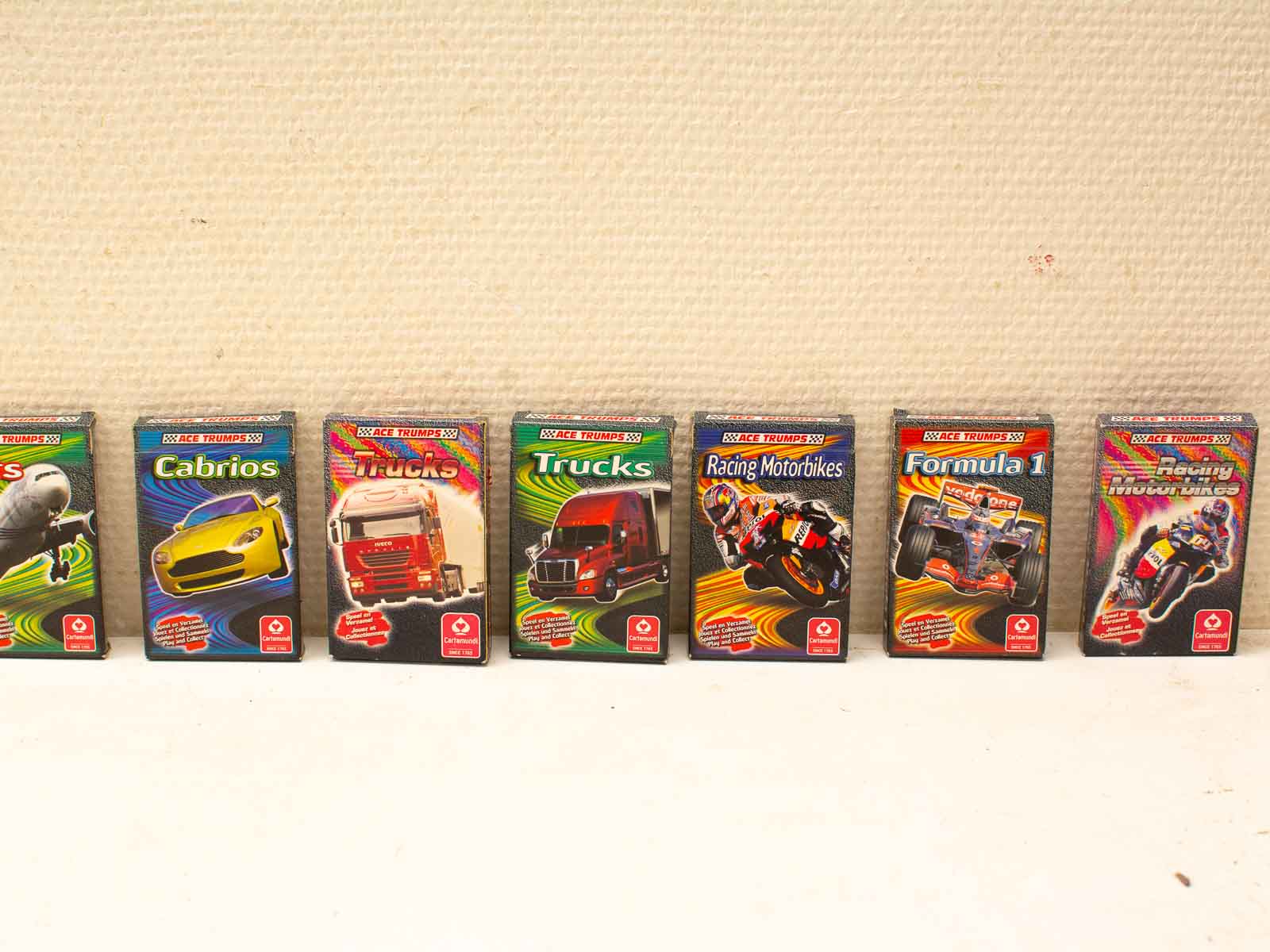 Ace Trumps Vehicle Card Collection featuring racing cars, trucks, and motorbikes for motorsport enthusiasts.