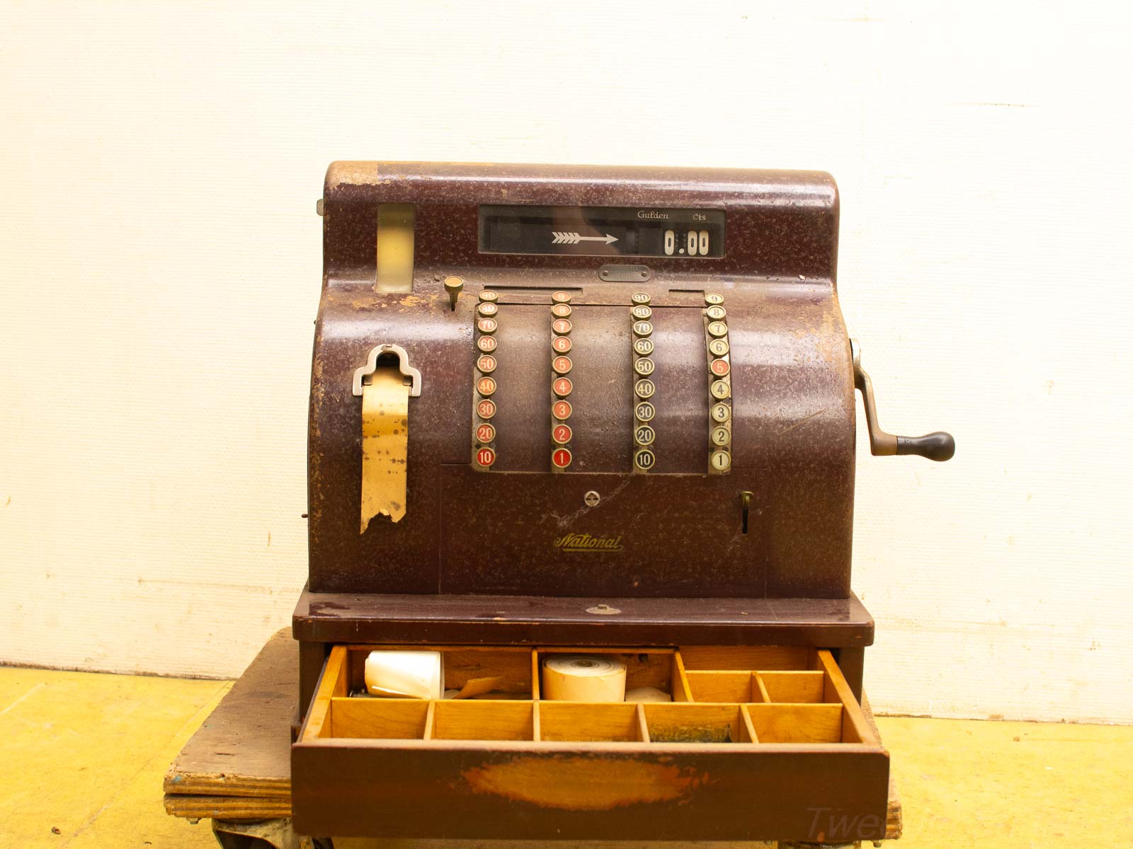 Vintage mechanical cash register exuding charm and nostalgia, perfect for classic decor.