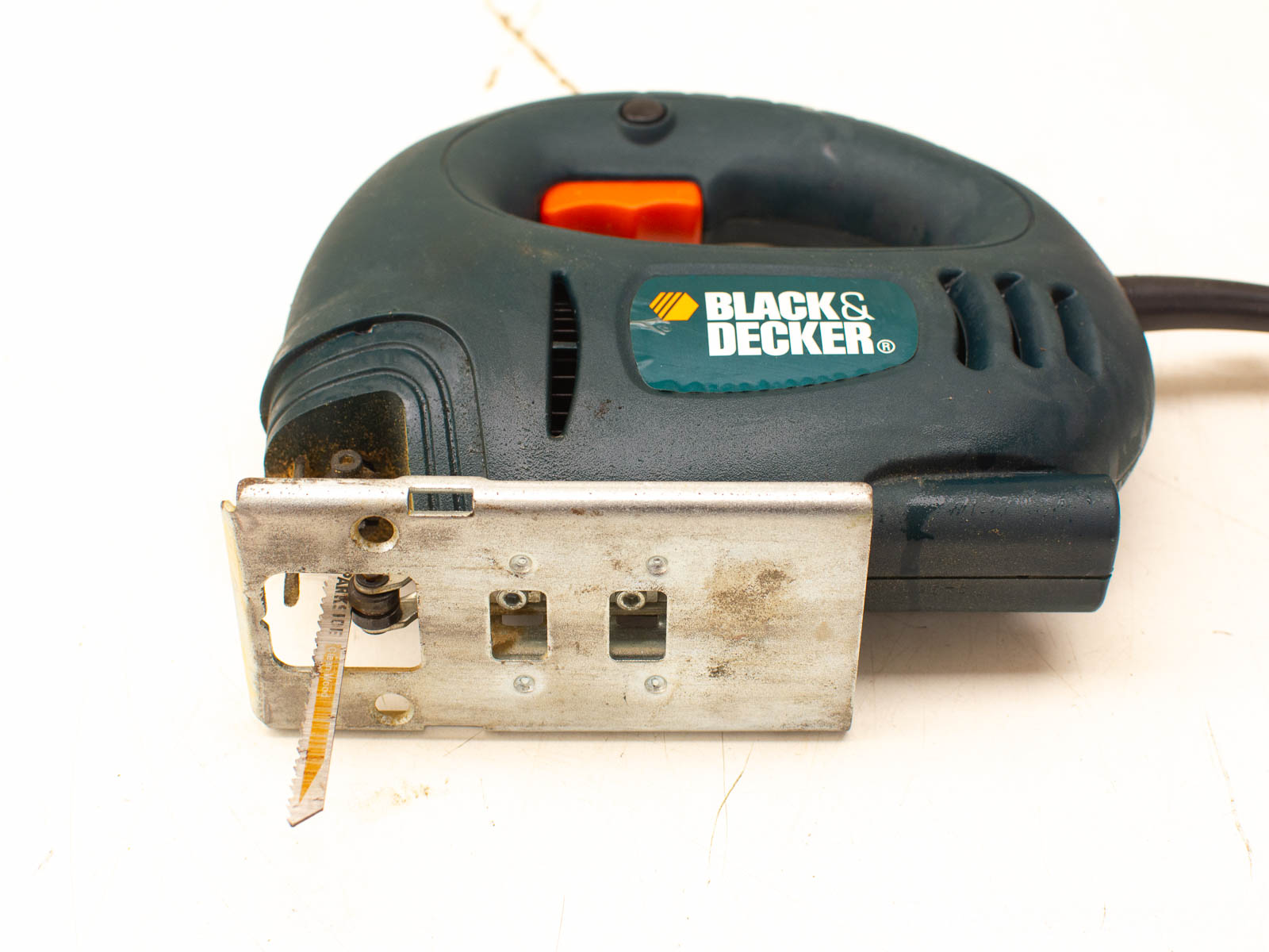 Black & Decker jigsaw for precise wood and metal cutting, durable and ergonomic design.