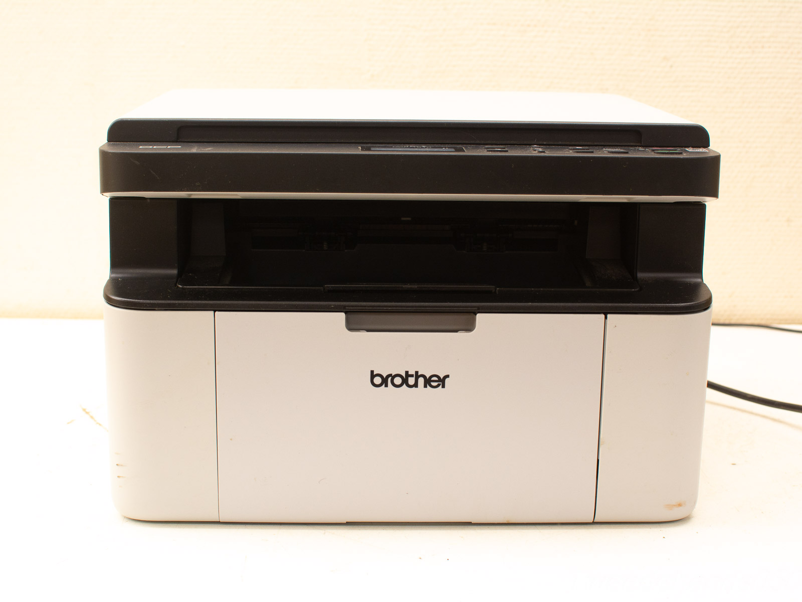 Compact Brother multifunction printer in good condition, ideal for home or office use.