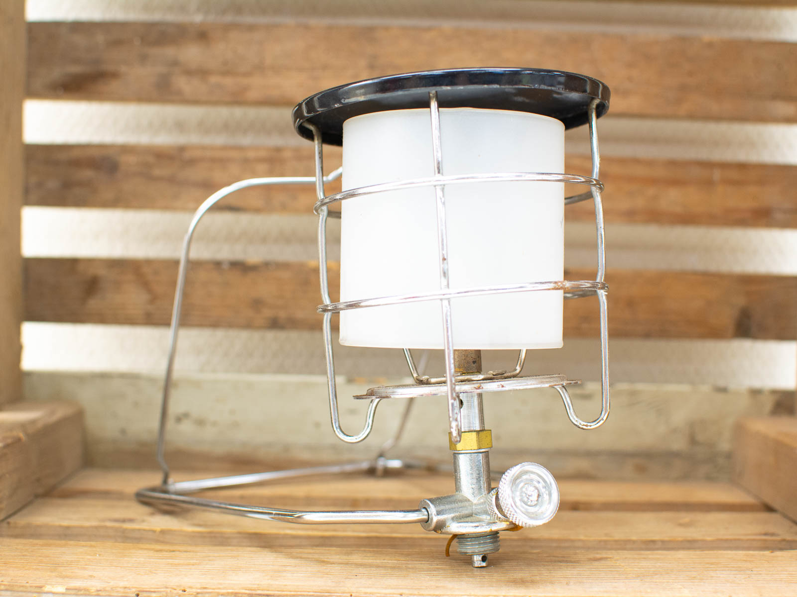 Vintage metal and glass lantern, perfect for camping and rustic decor