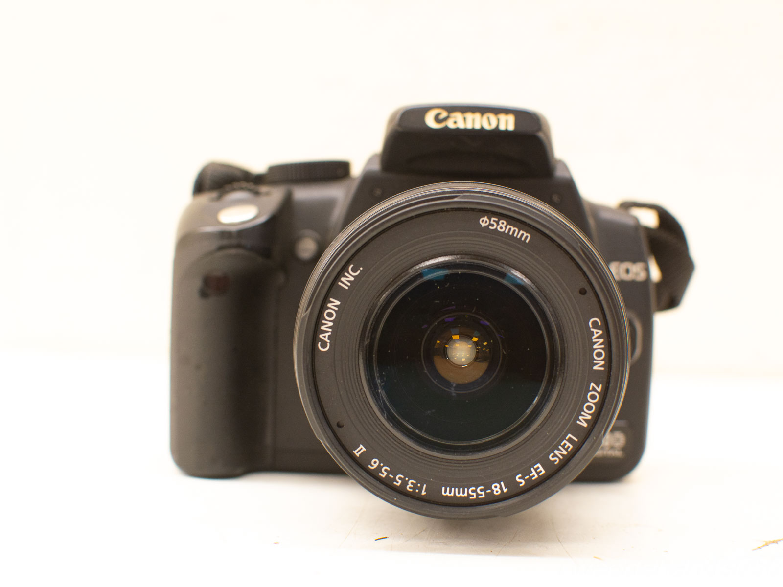 Canon EOS DSLR camera with 18-55mm lens for sale, perfect for all photography skill levels.