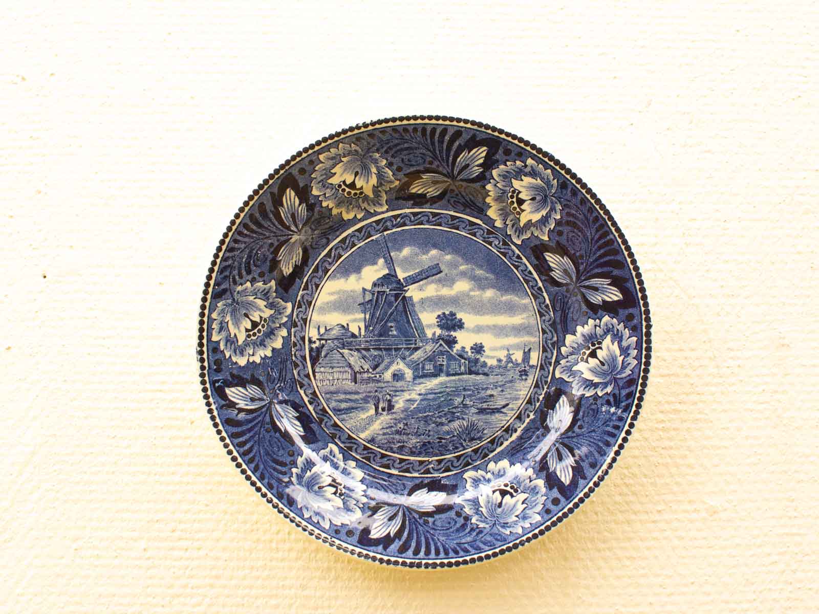 Dutch Landscape Decorative Plate: Hand-Painted Windmill and Floral Patterns on Blue Ceramic