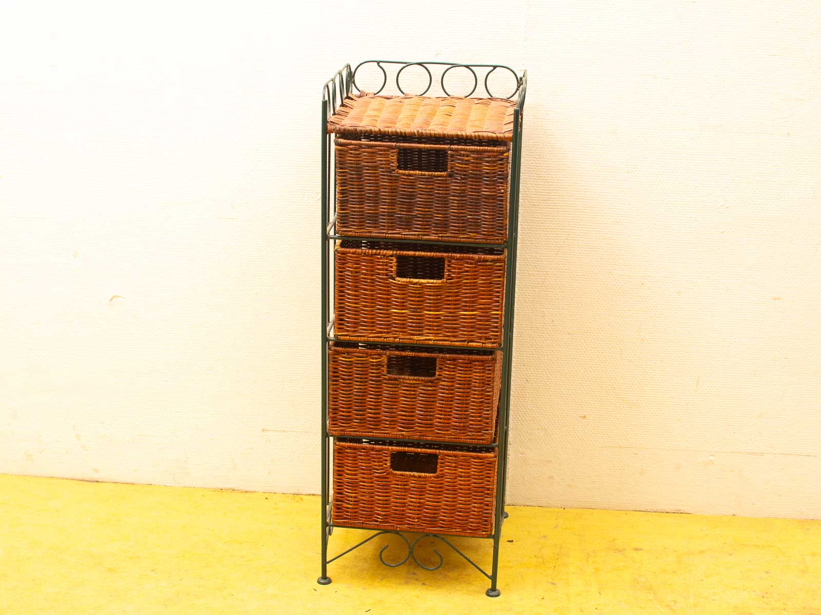 Stylish storage unit with woven baskets, perfect for organizing vintage items in any space.