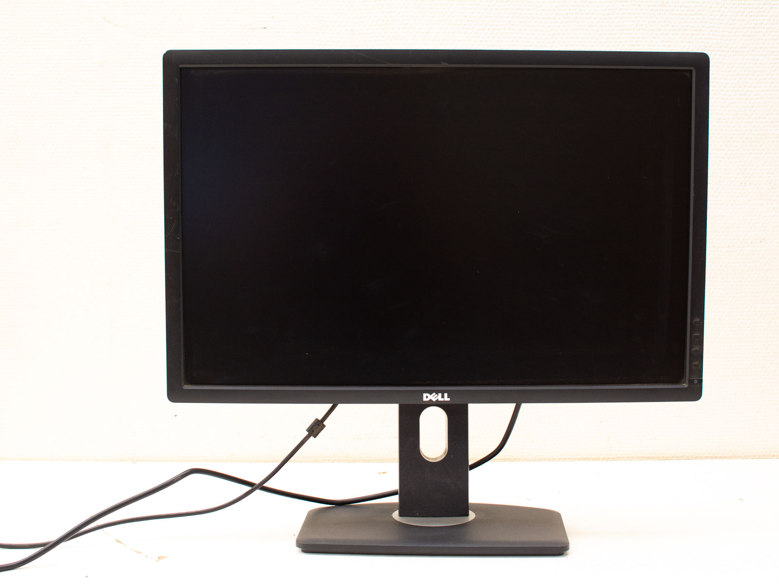 Sleek Dell monitor with height adjustment and minimalist design for an organized workspace.