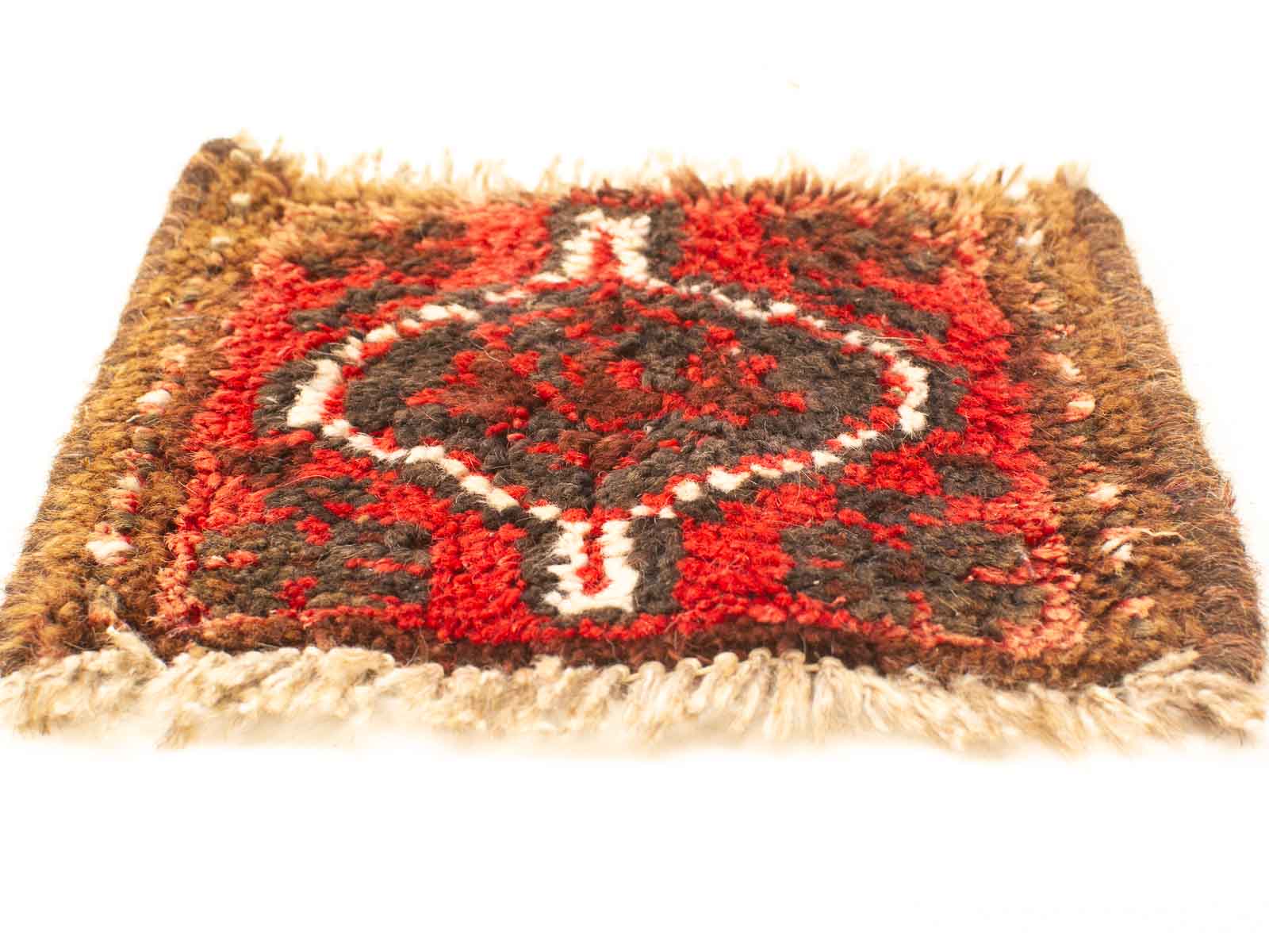 Handwoven Red and Brown Rug with Intricate Geometric Patterns Reflecting Cultural Heritage and Artistry