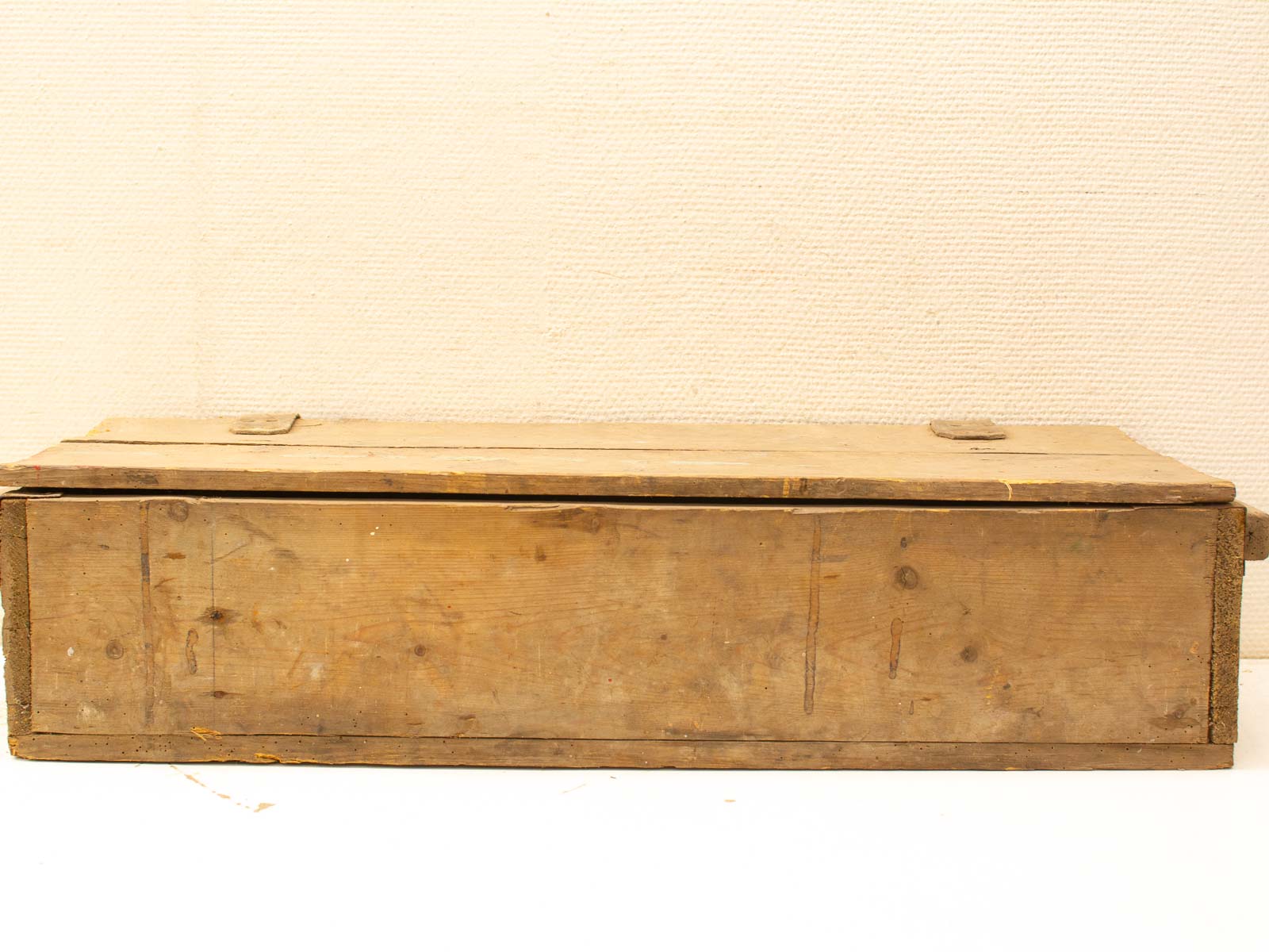 Vintage wooden toolbox with rustic charm, showcasing years of reliable use and craftsmanship.