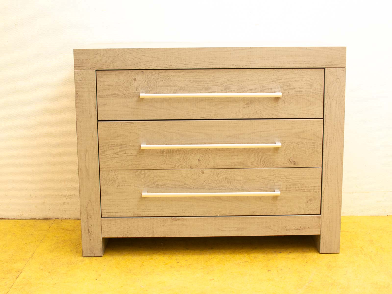 Modern six-drawer dresser in light wood, perfect for stylish and functional home decor.