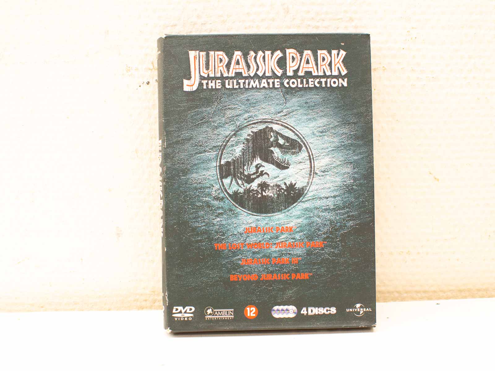 Jurassic Park Ultimate DVD Collection: All films and T-Rex artwork in one thrilling set.