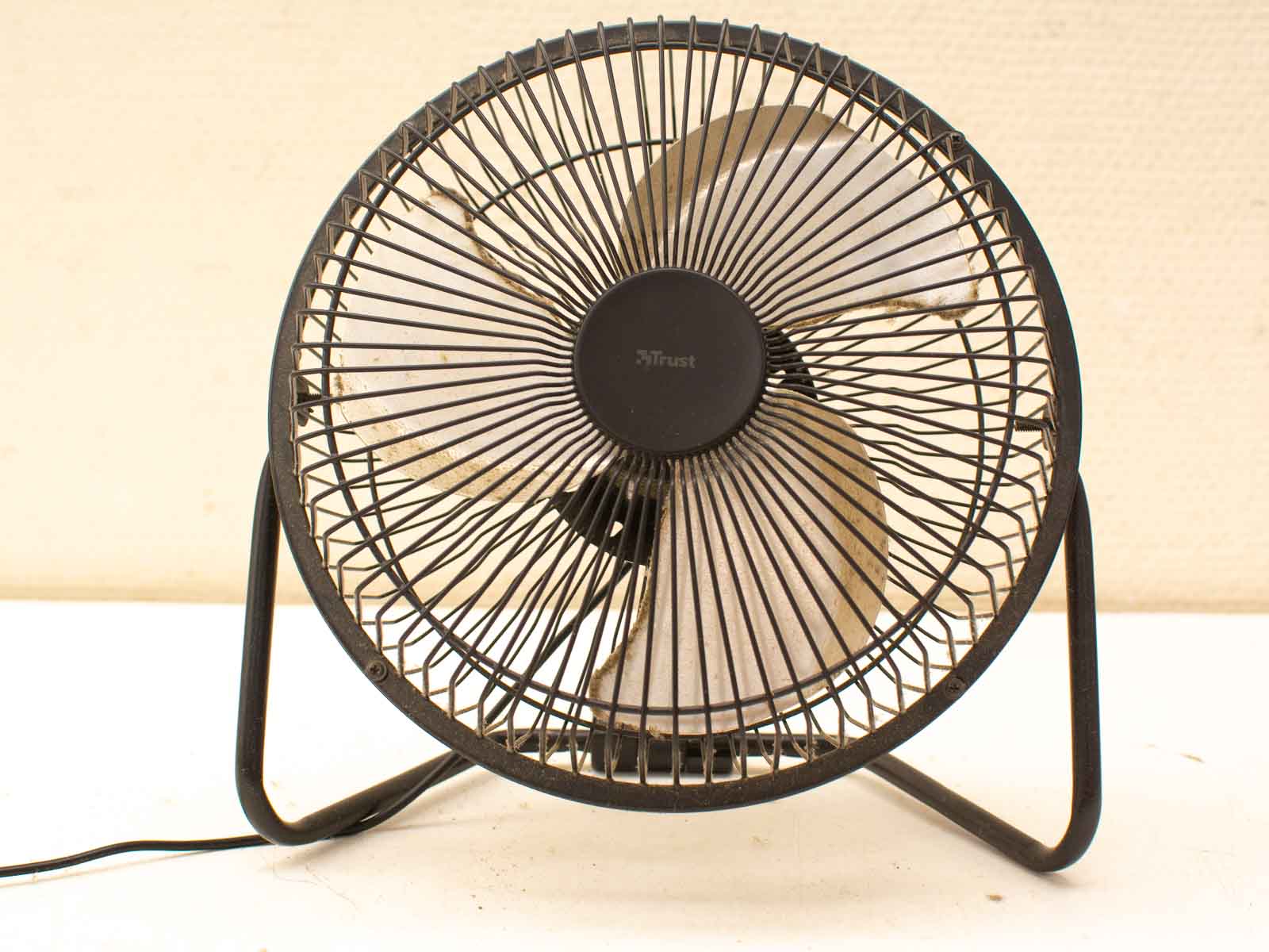 Retro black table fan for vintage charm and effective cooling in any space.