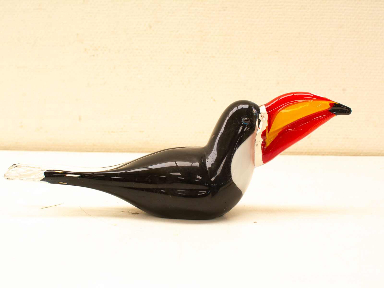 Vibrant glass toucan sculpture, a stunning vintage art piece perfect for collectors.