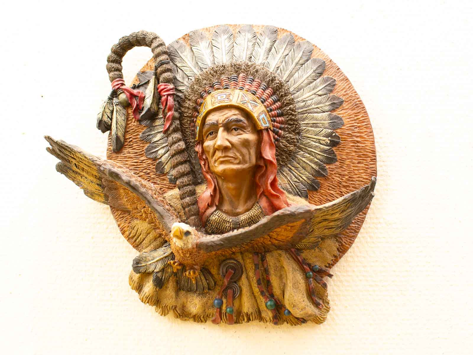 Stunning Native American chief and eagle sculpture symbolizing strength, wisdom, and cultural heritage.