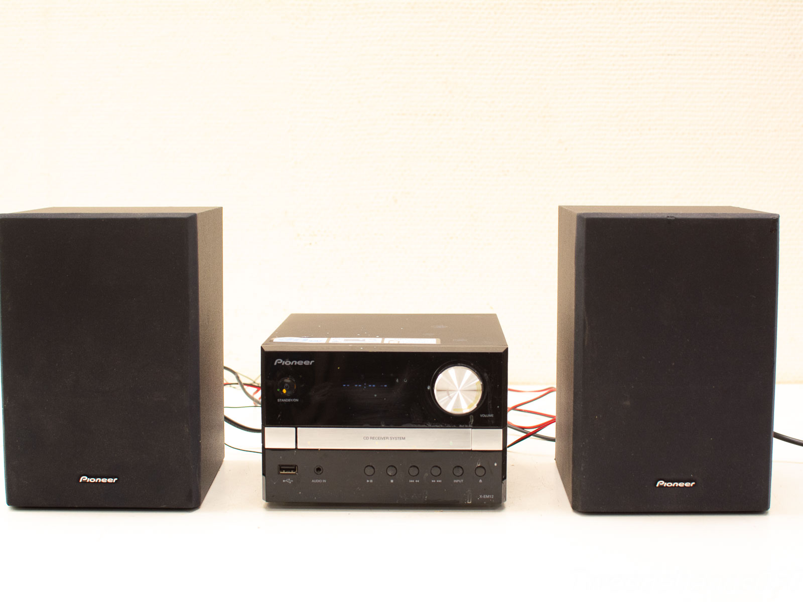 Sleek compact audio system with stylish speakers, perfect for quality sound in modern homes.