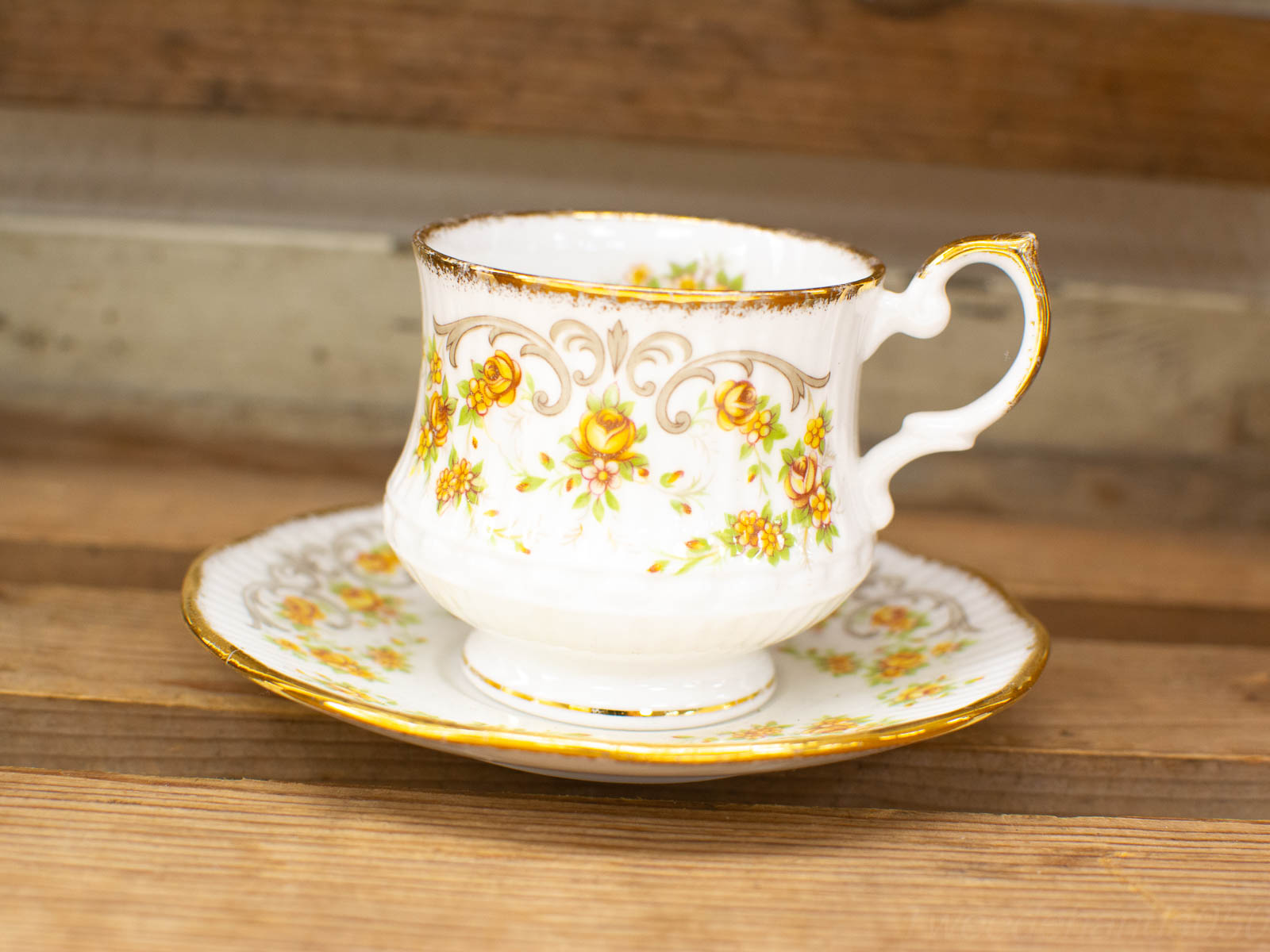 Elegant floral porcelain tea cup and saucer set, perfect for afternoon tea.