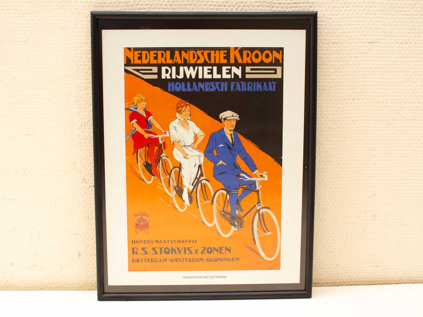 Vintage bicycle ad featuring elegant cyclists, showcasing local craftsmanship in vibrant art deco style.