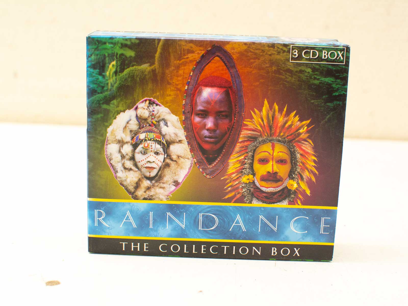 Raindance: Explore vibrant cultural music through colorful masks and traditions in this stunning collection.