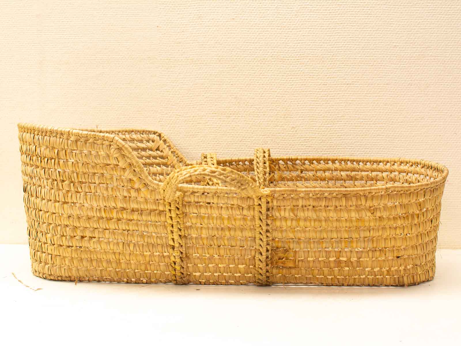 Handcrafted natural woven basket in golden hue, ideal for versatile storage and decor.