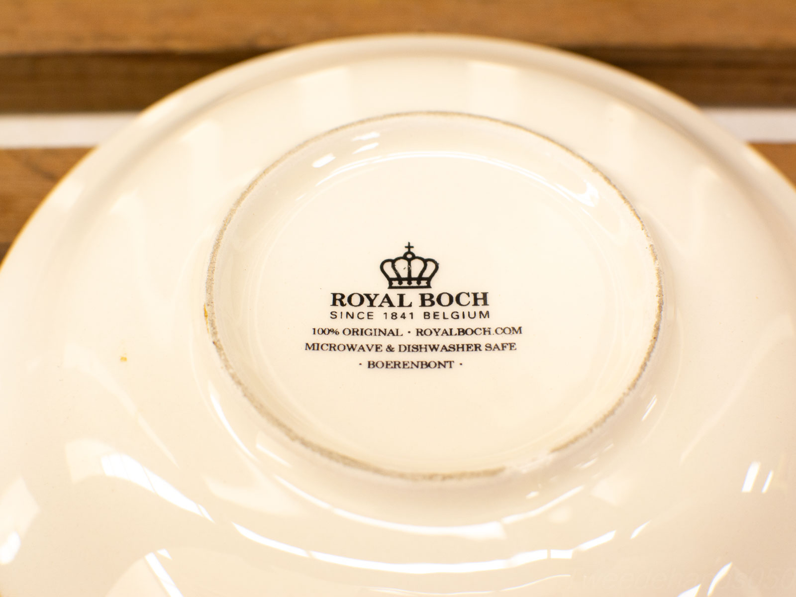 Elegant Royal Boch cream white plate, crafted since 1841, perfect for everyday use and special occasions.