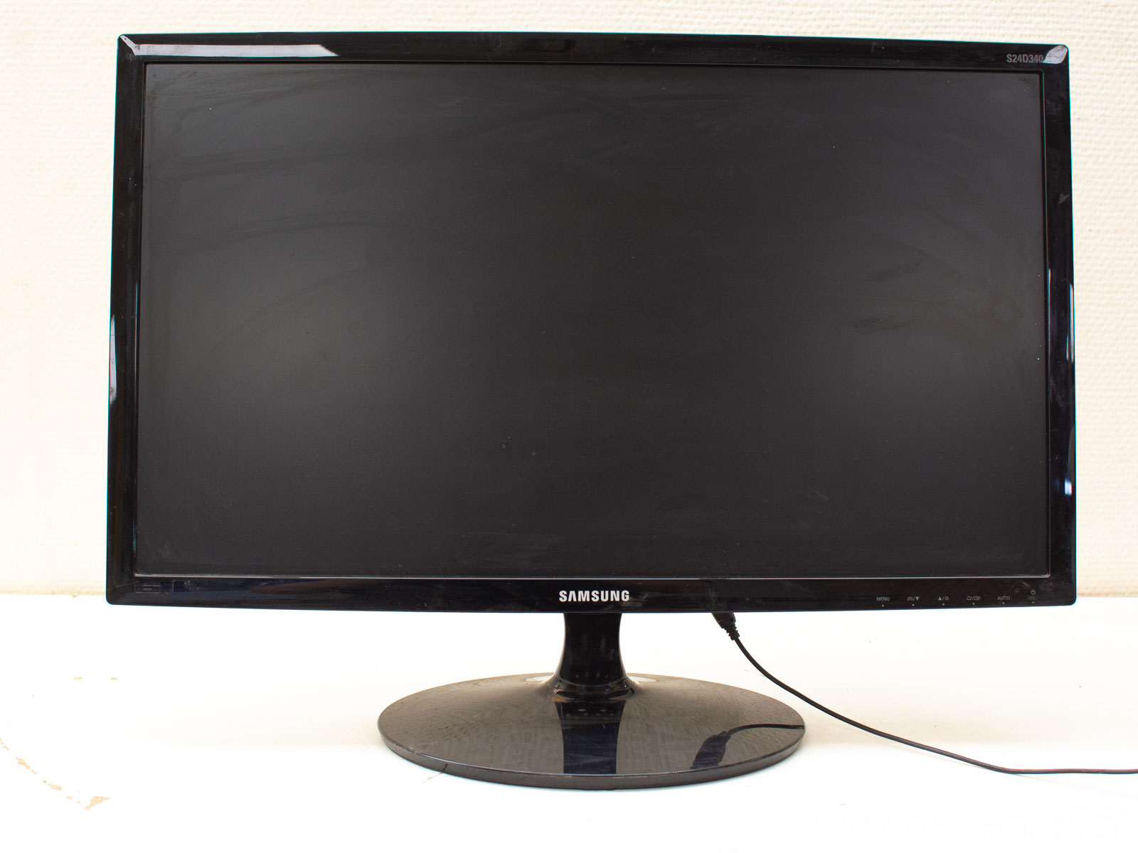 Sleek black Samsung monitor with modern design, slim bezel, and glossy finish for contemporary workspaces.