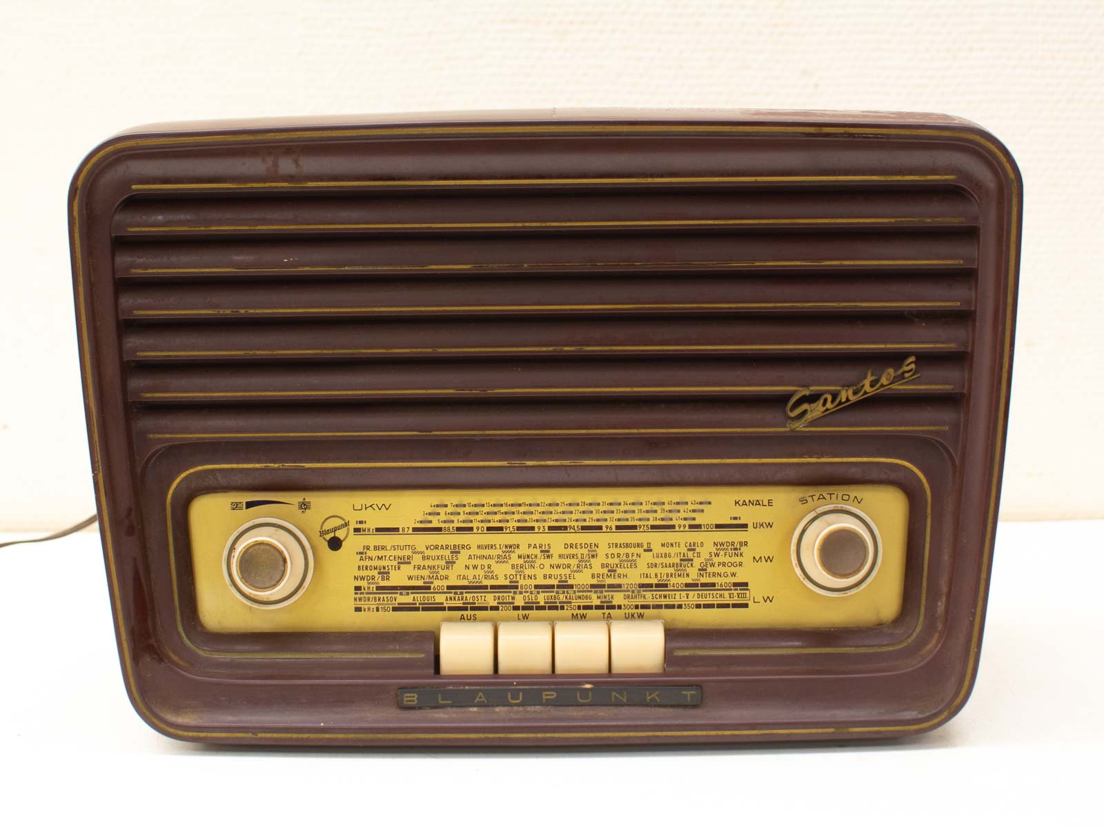 Retro Blaupunkt Radio in Deep Maroon with Gold Panel, offering Multiple Frequency Bands