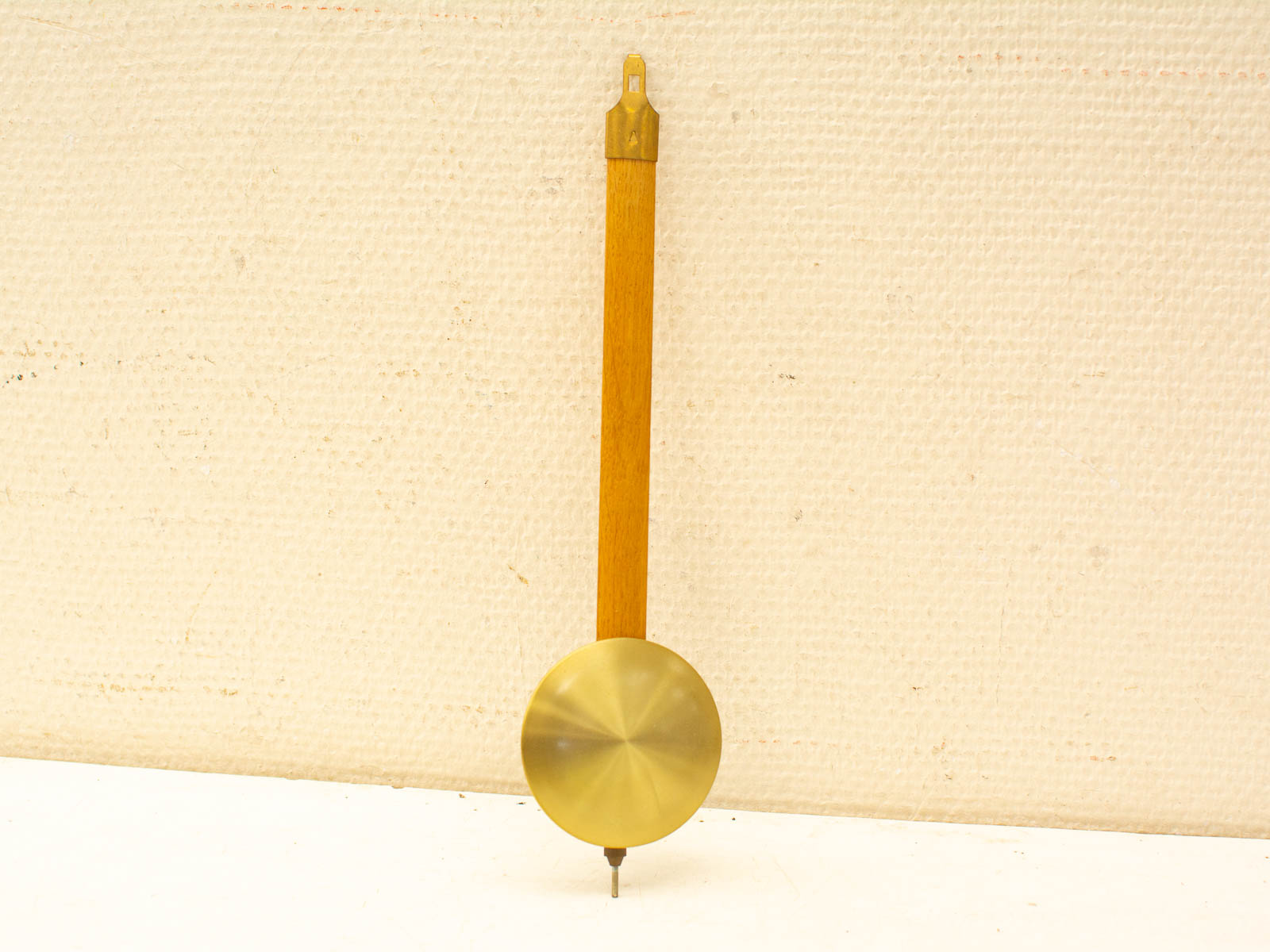 Elegant vintage wooden drafting tool with polished brass fittings for design enthusiasts.