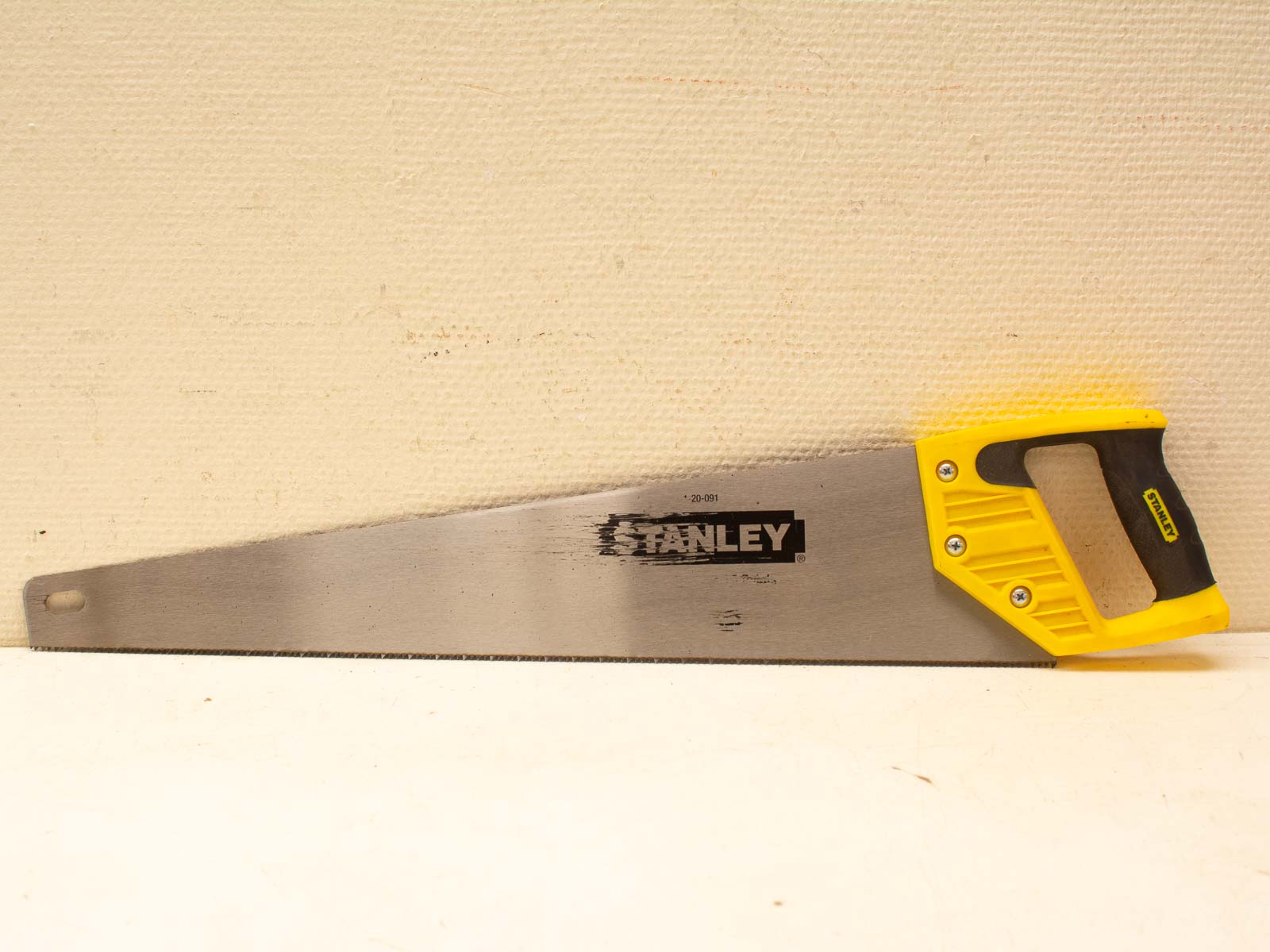 Ergonomic Yellow-Black Hand Saw for Efficient Woodworking and DIY Projects