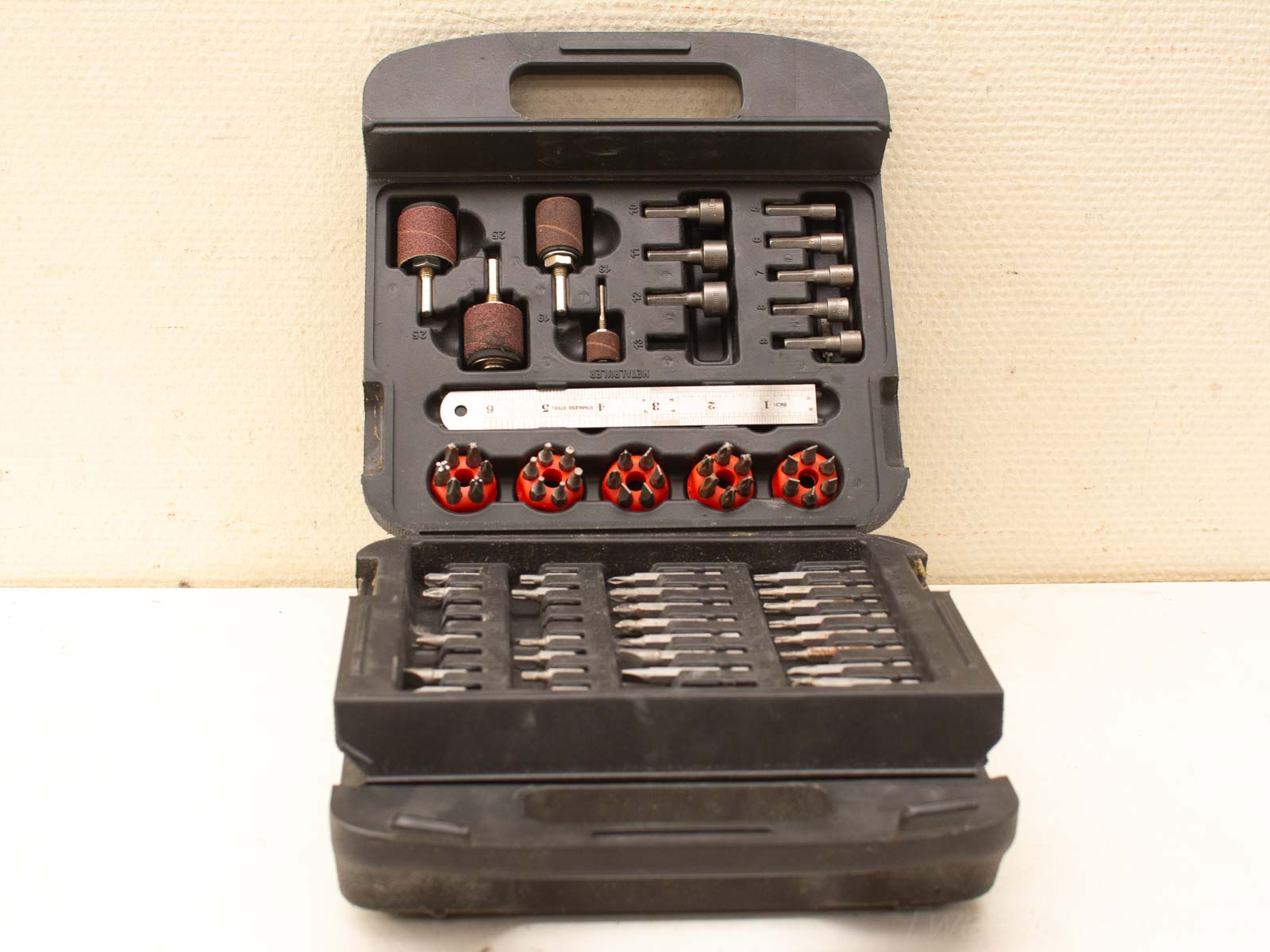 Durable black tool kit with organized accessories for DIY enthusiasts and professionals.