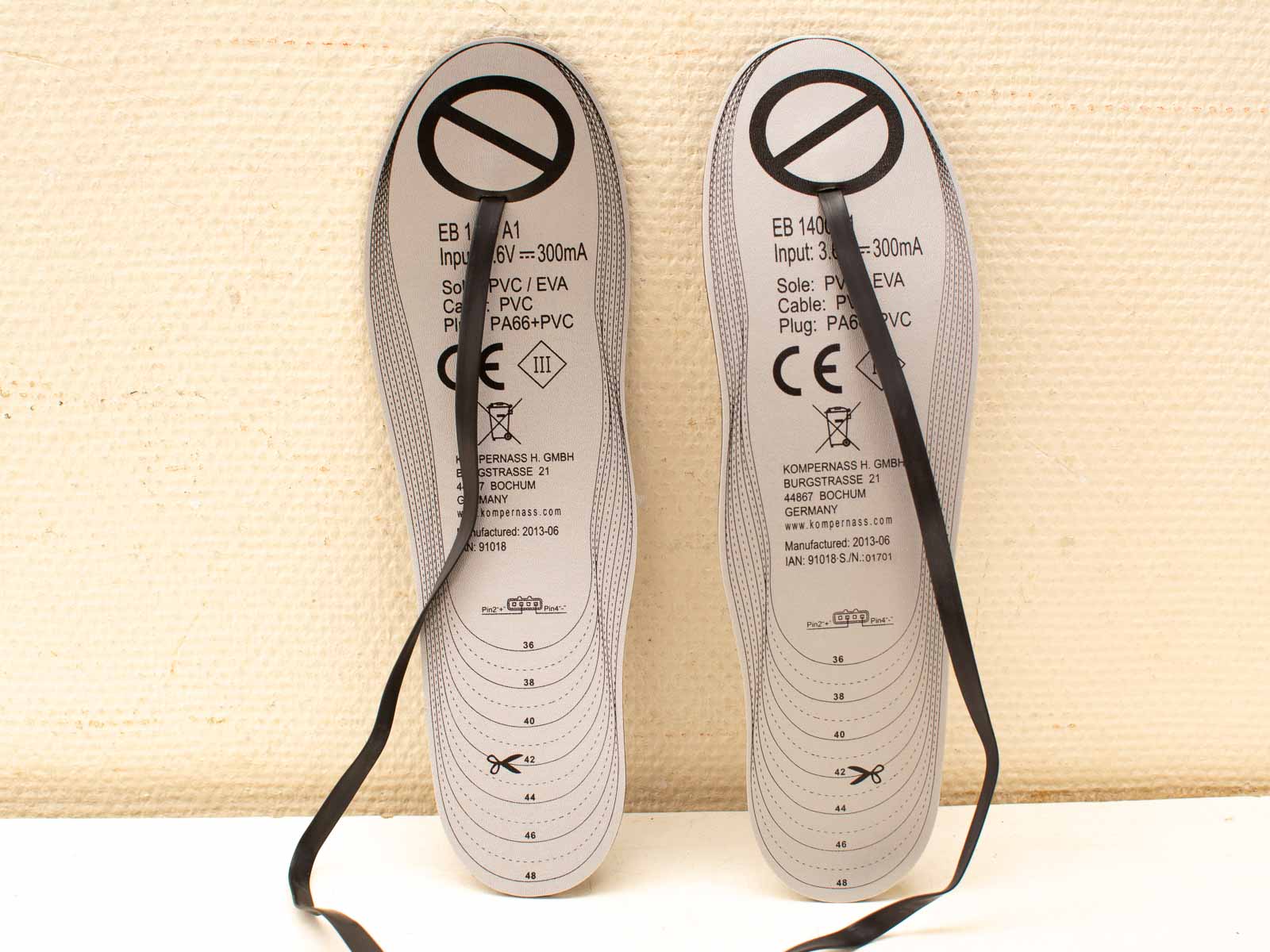 Comfortable gray insoles for shoes, sizes 36-48, made from durable PVC and EVA materials.