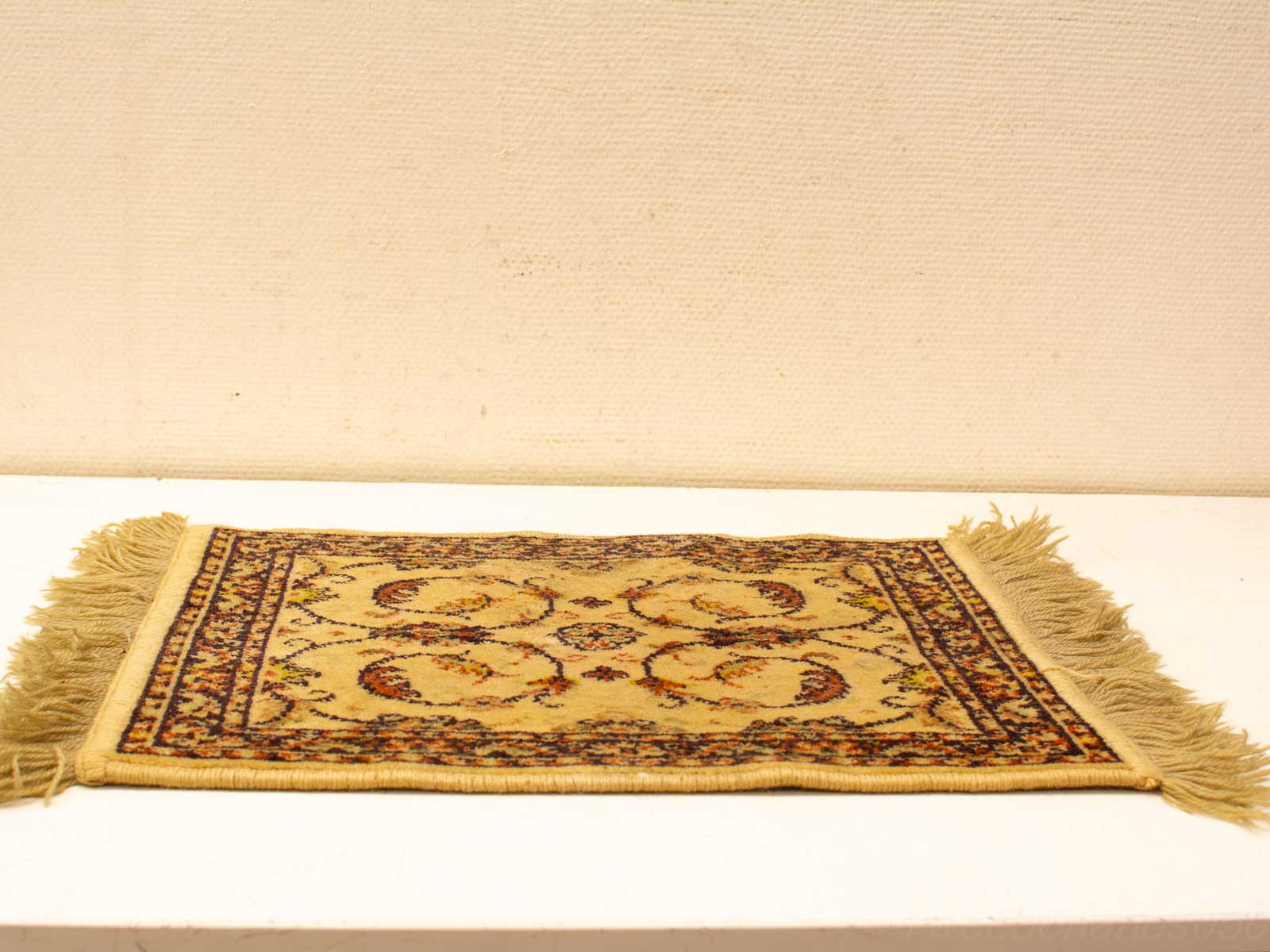 Elegant vintage area rug with floral motifs in warm colors, perfect for enhancing any space.