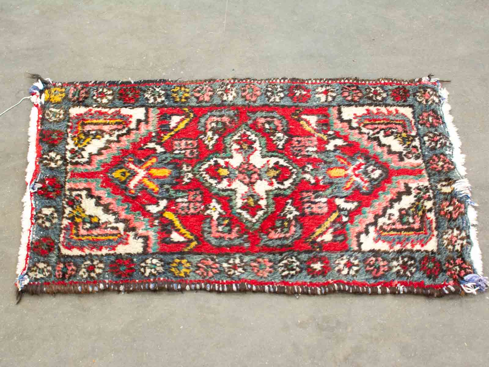 Handmade Vintage Rug with Vibrant Colors and Intricate Geometric Patterns