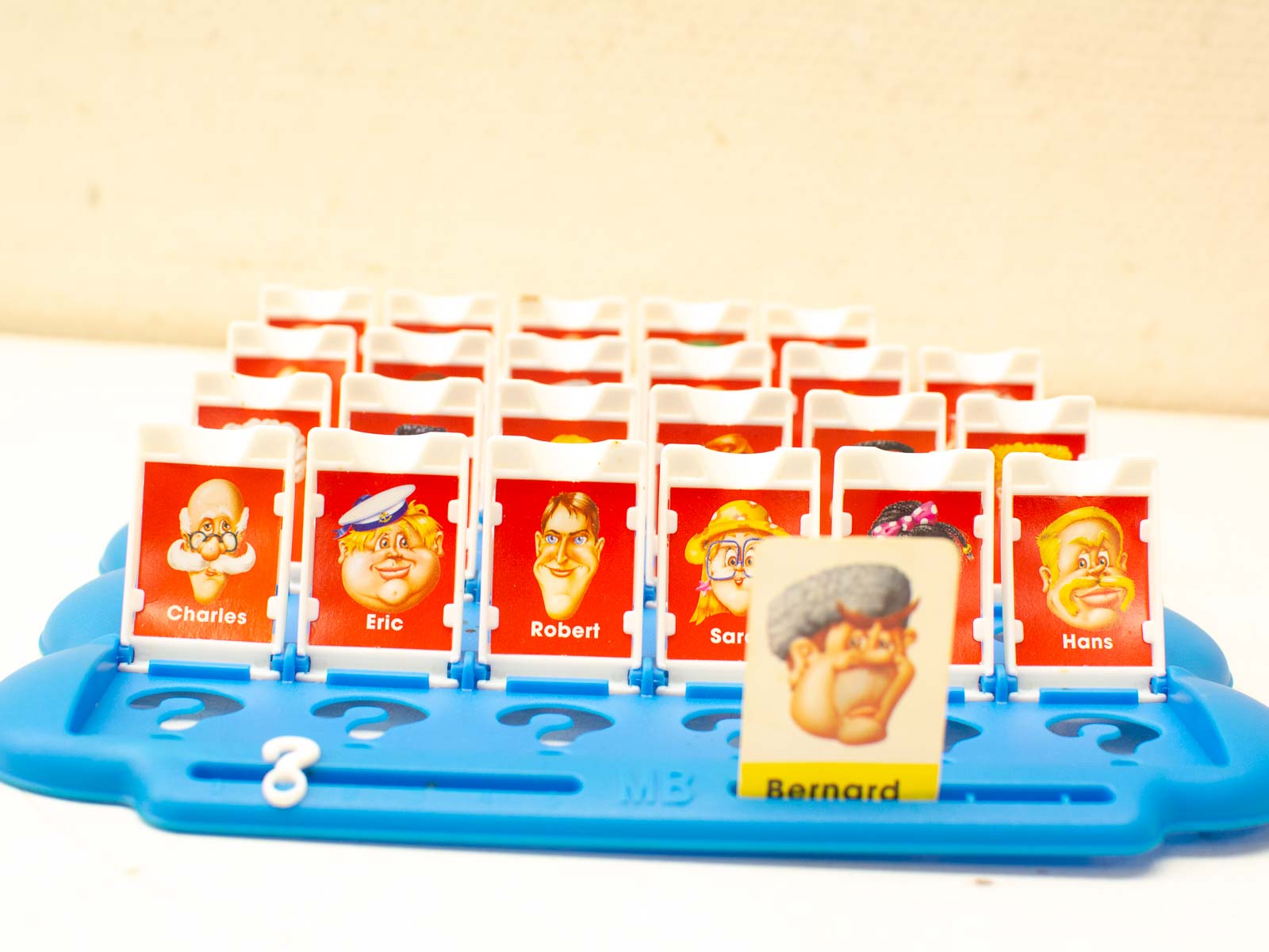 Classic Guess Who? board game with vibrant characters, featuring Bernard for fun family gameplay.