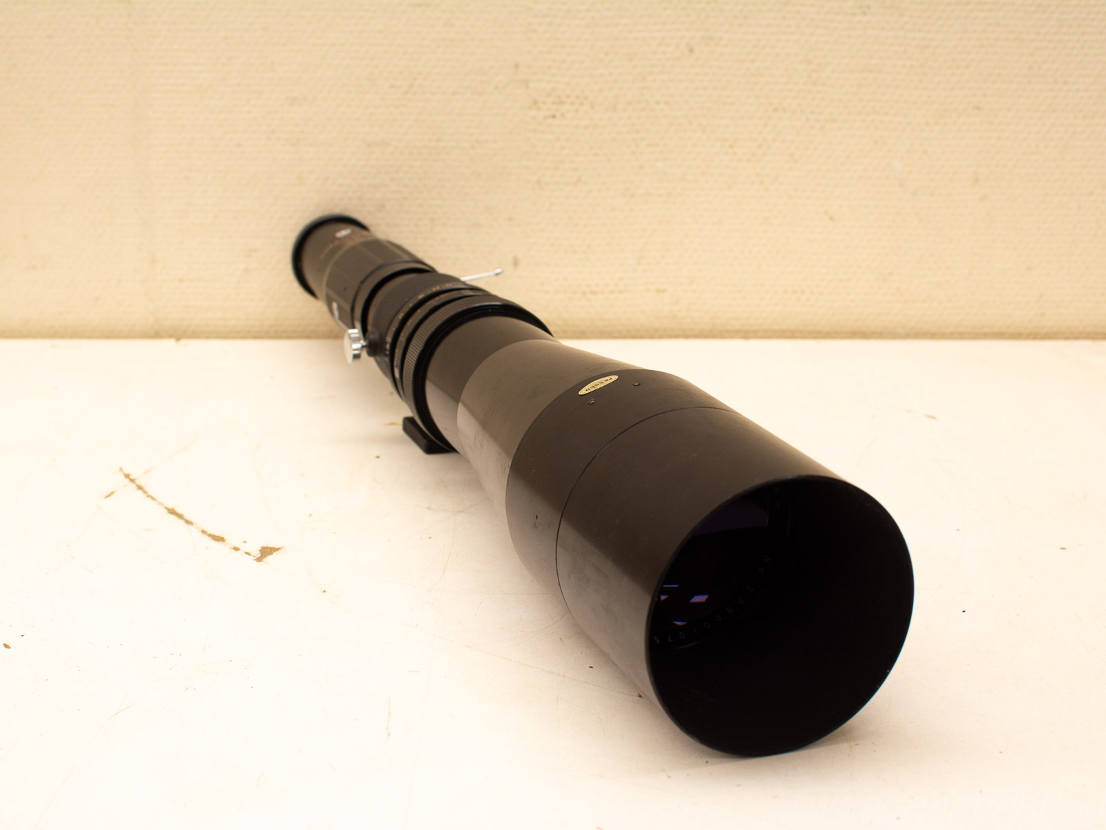 Sleek black telescope ideal for astronomy and wildlife observation. High-quality optics for clear viewing.