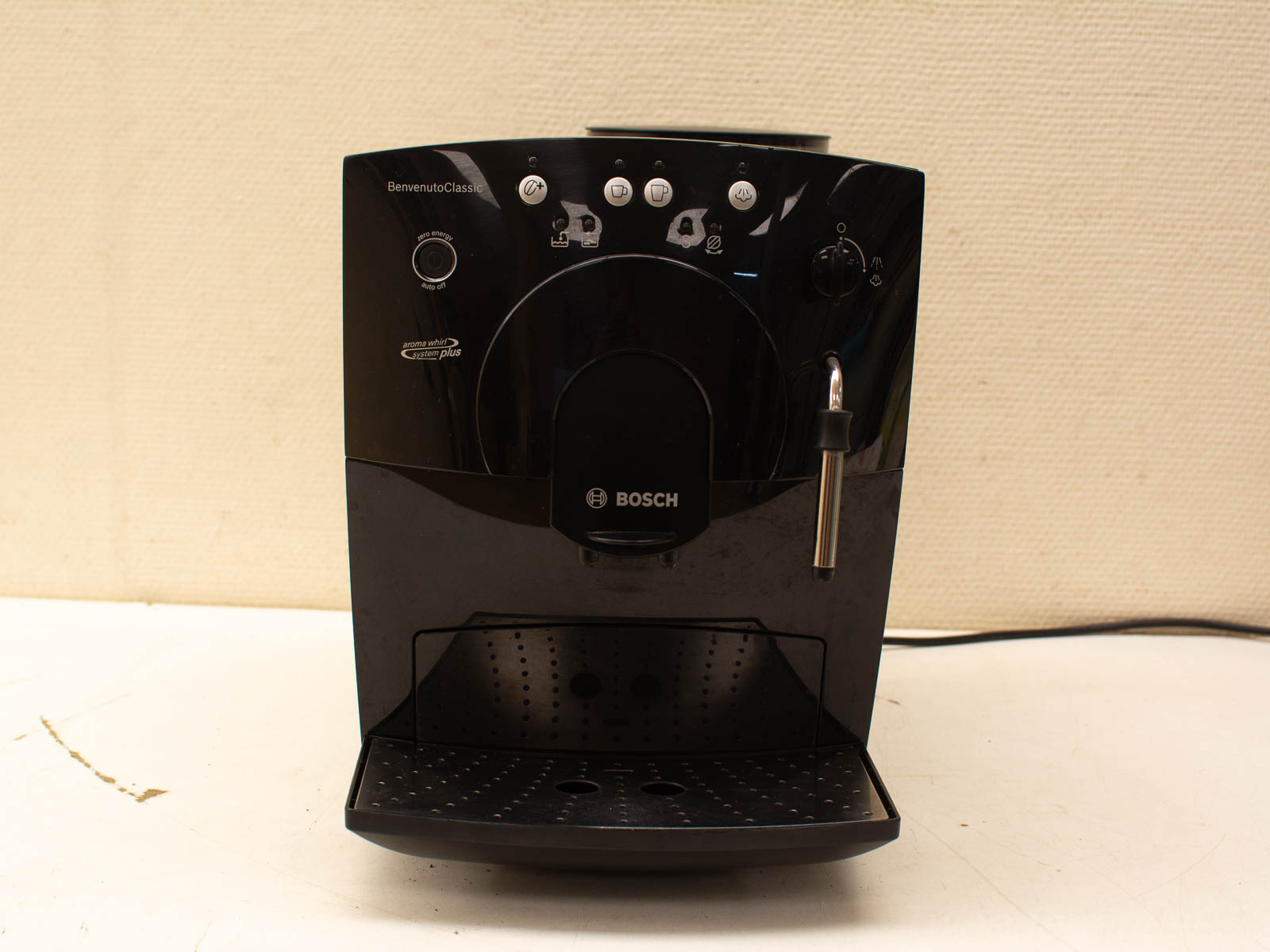 Sleek Bosch Benvenuto Classic coffee machine with user-friendly controls and milk frother.