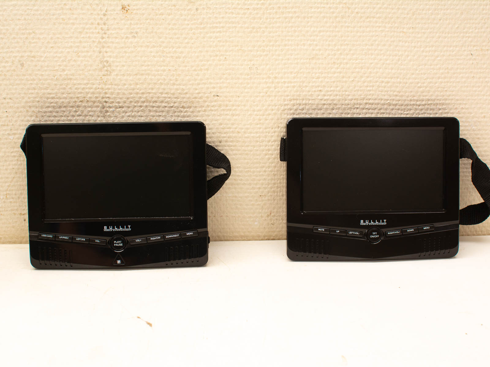 Sleek black BULLIT portable media players, perfect for multimedia playback on the go.