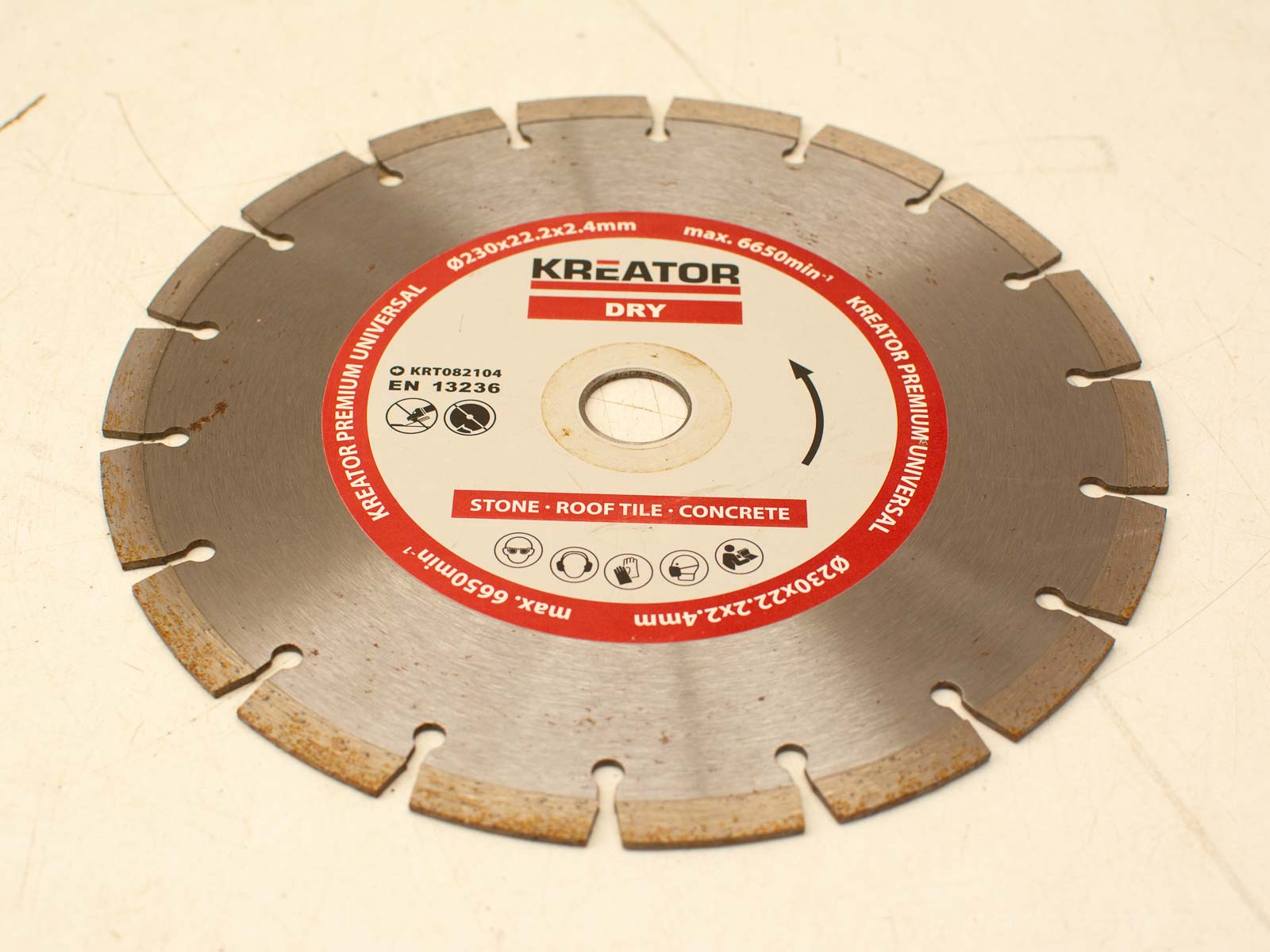 Kreator 230mm diamond blade for efficient dry cutting of stone, concrete, and other tough materials.