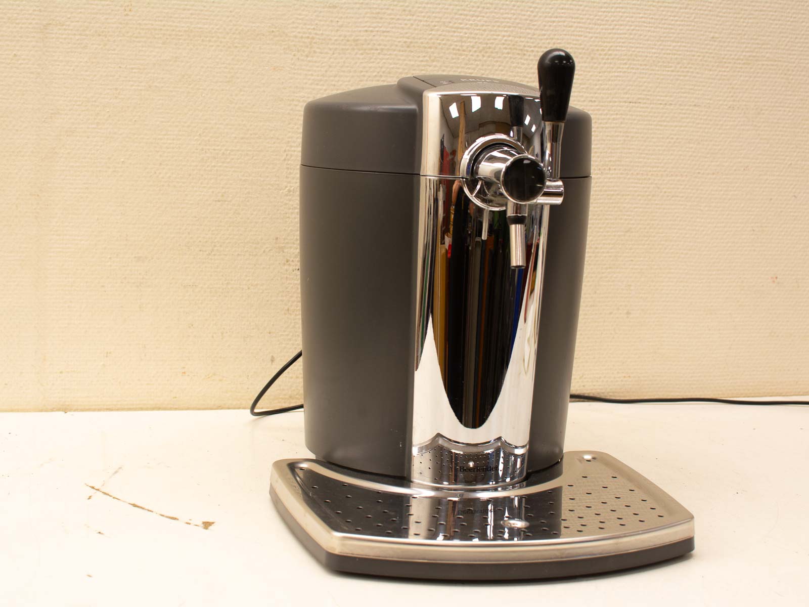 Sleek gray beverage dispenser with chrome accents, ideal for home bars and entertaining guests.