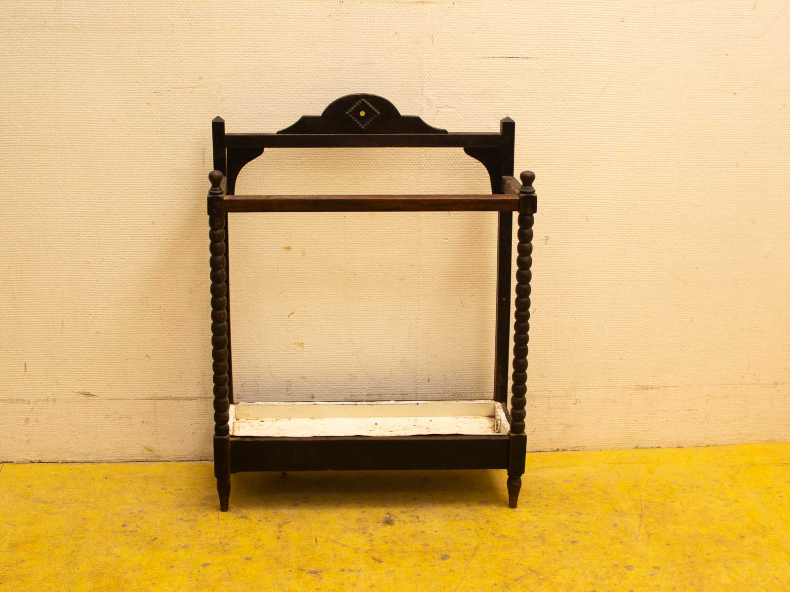 Elegant vintage wooden shelf with decorative inlay, perfect for enhancing any interior decor.