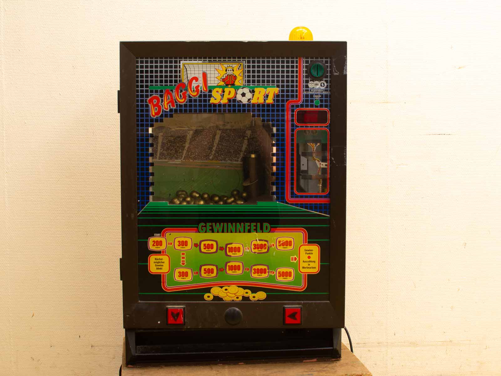 Vintage sport vending machine: a colorful retro game for skillful players to enjoy.