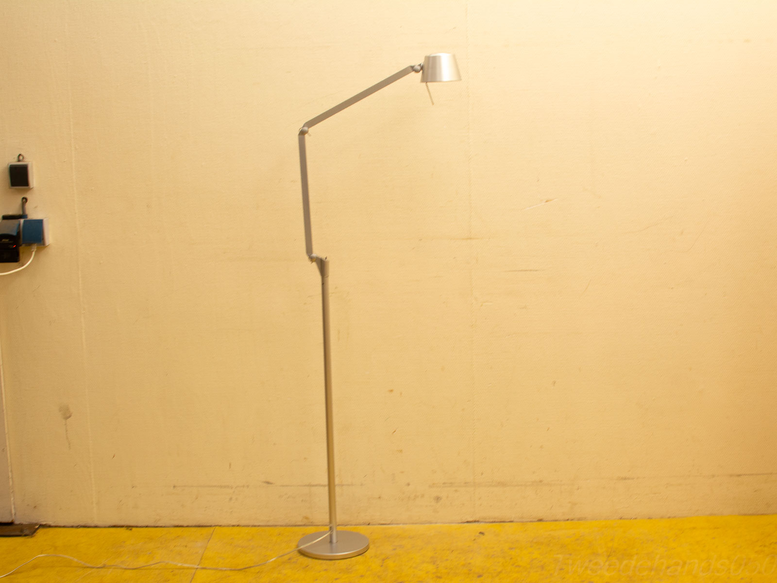 Sleek adjustable floor lamp in modern design, perfect for reading and adding style to any space.