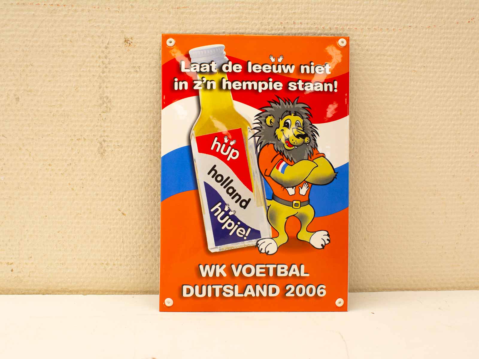 Support the Dutch national team in the 2006 World Cup with this vibrant celebration sign.