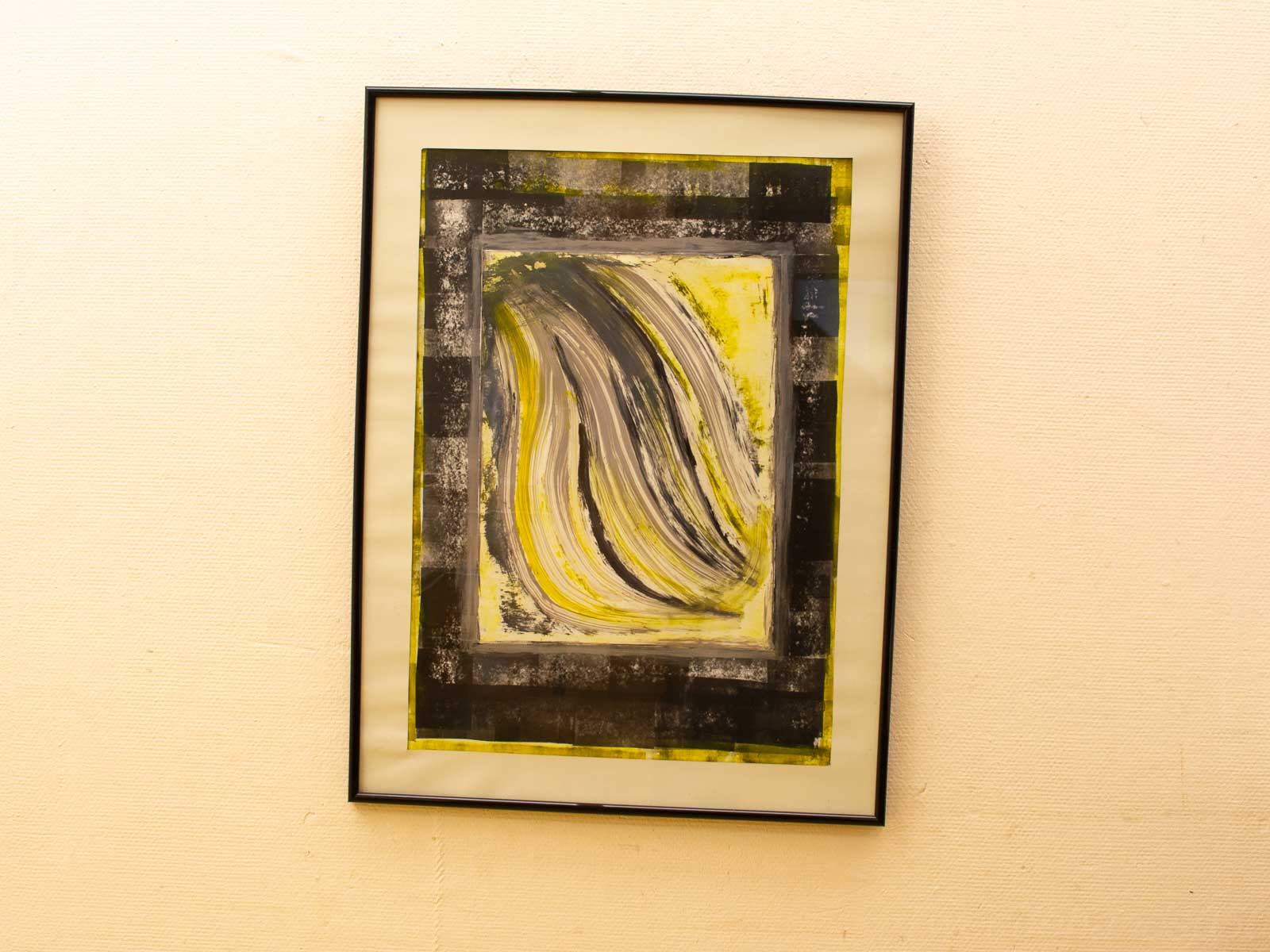 Abstract art with dynamic swirls in gray and white, accented by vibrant yellow highlights.