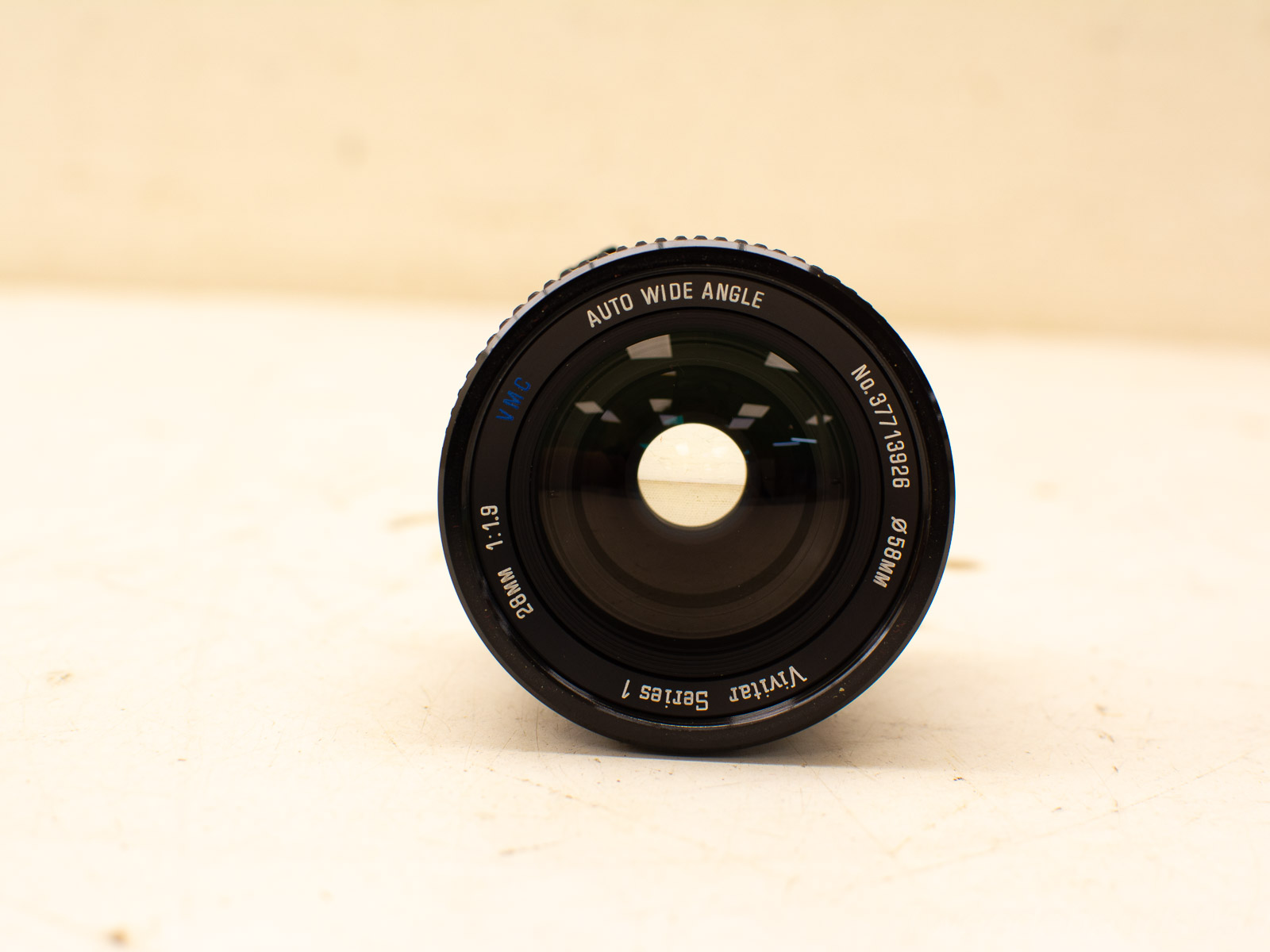 Vintage 28mm Auto Wide Angle Lens for breathtaking landscapes and exceptional image quality.