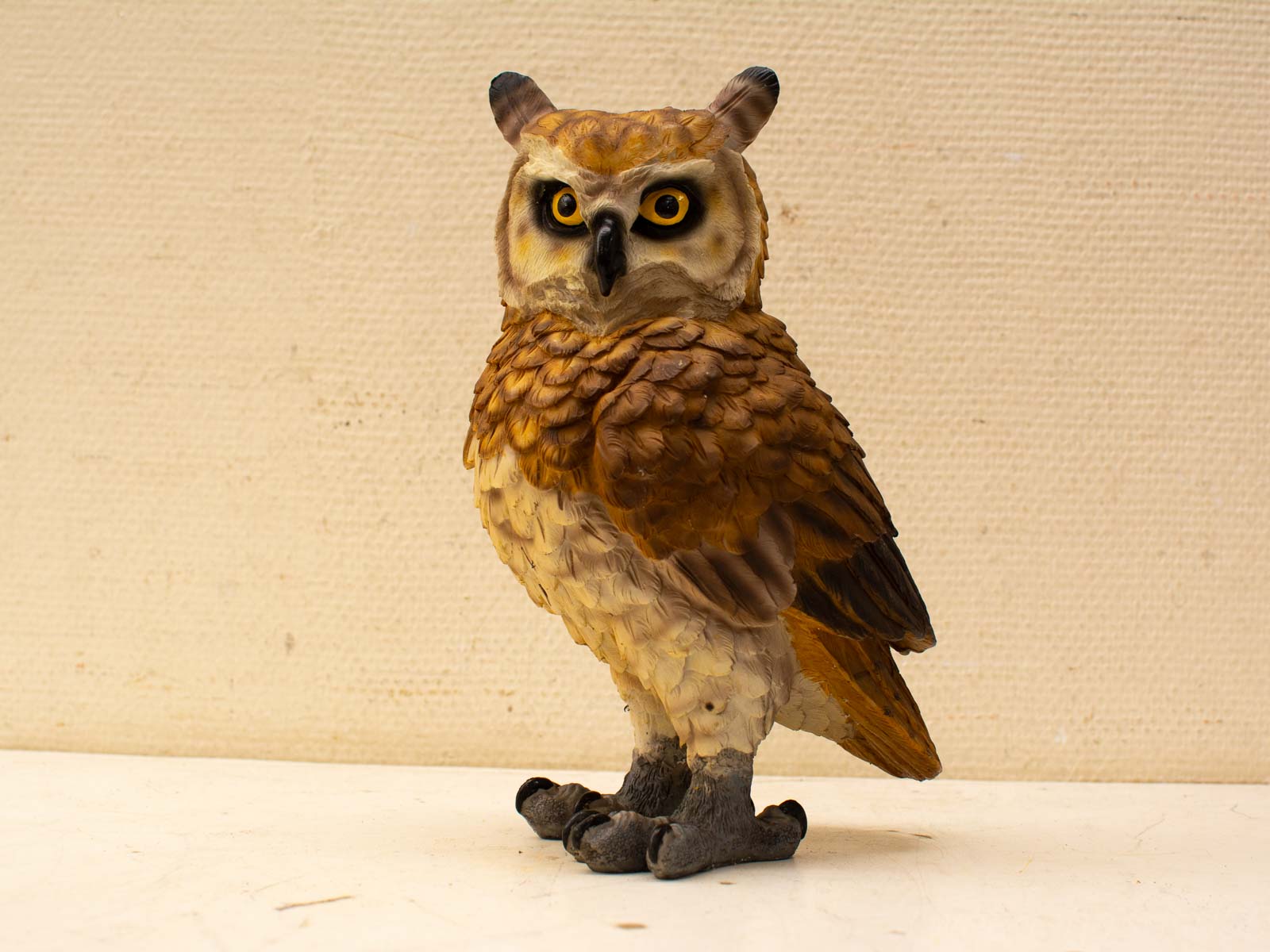 Intricately designed handcrafted owl figurine for vintage decor, featuring lifelike details and striking colors.